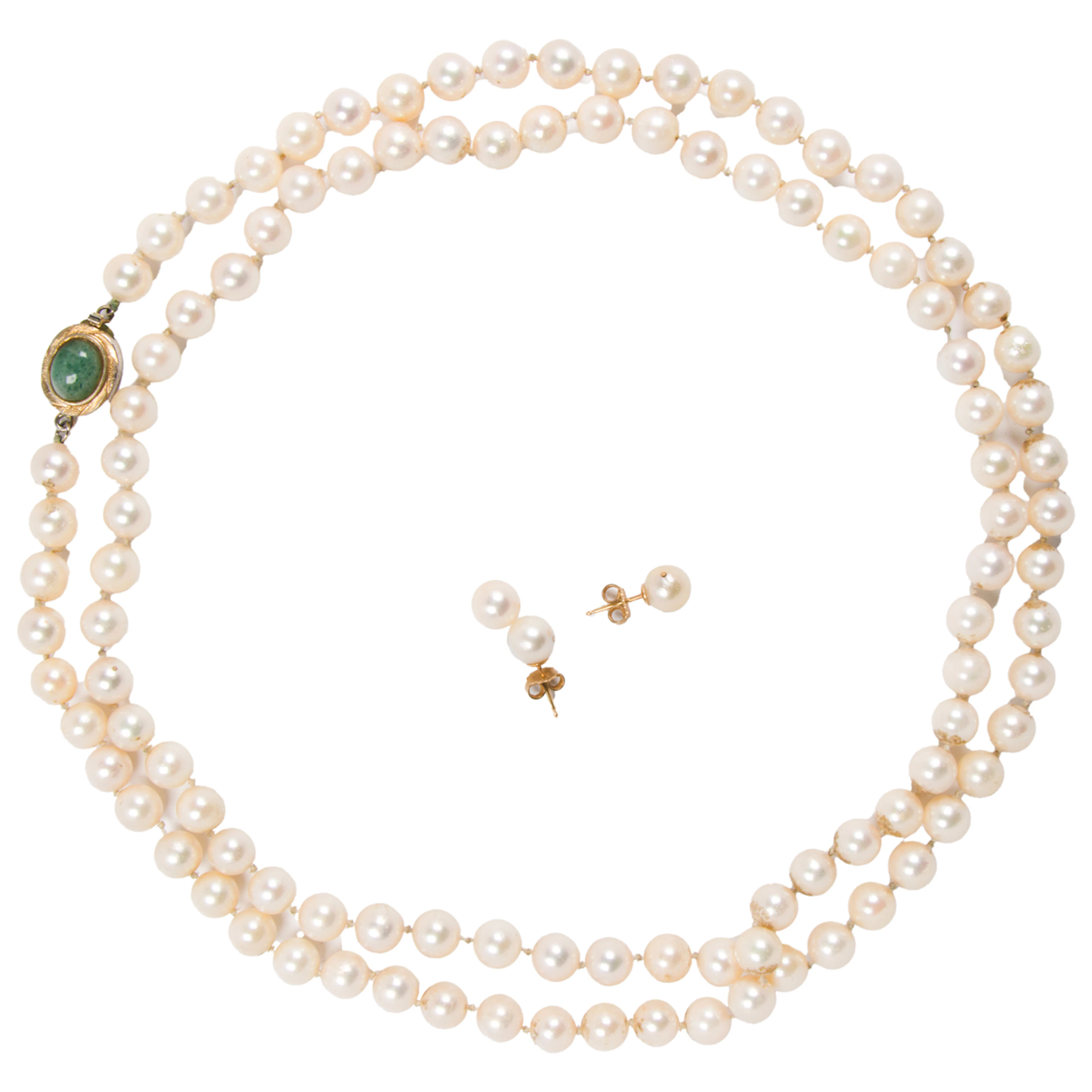 An opera length cultured pearl, hardstone, and silver necklace and earrings set