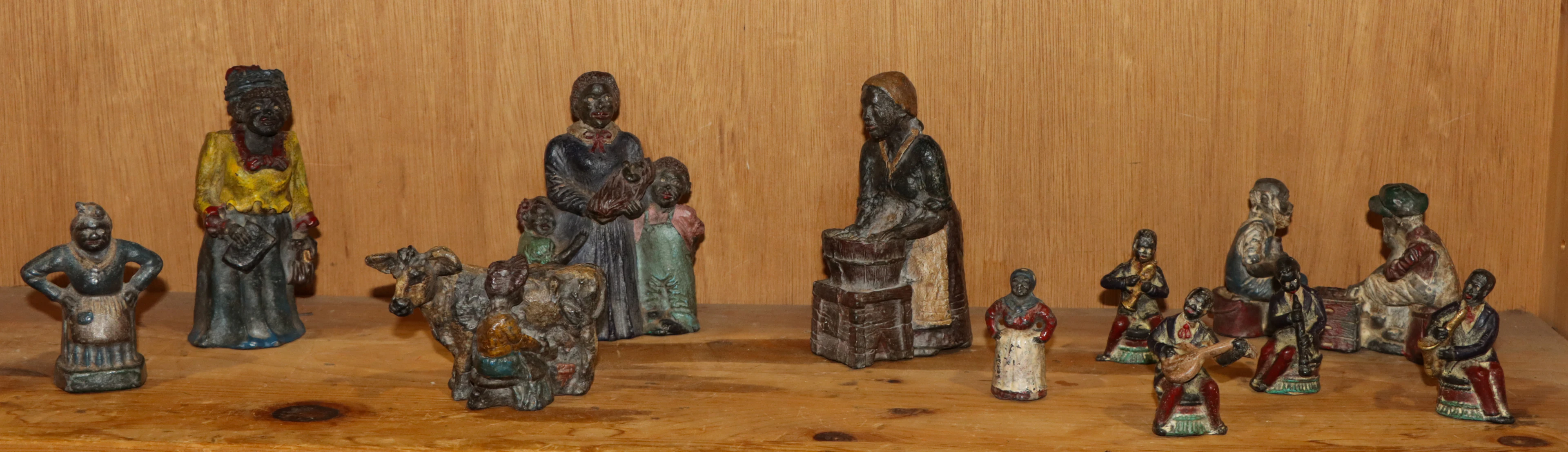 A group of eleven Black Americana painted lead figures