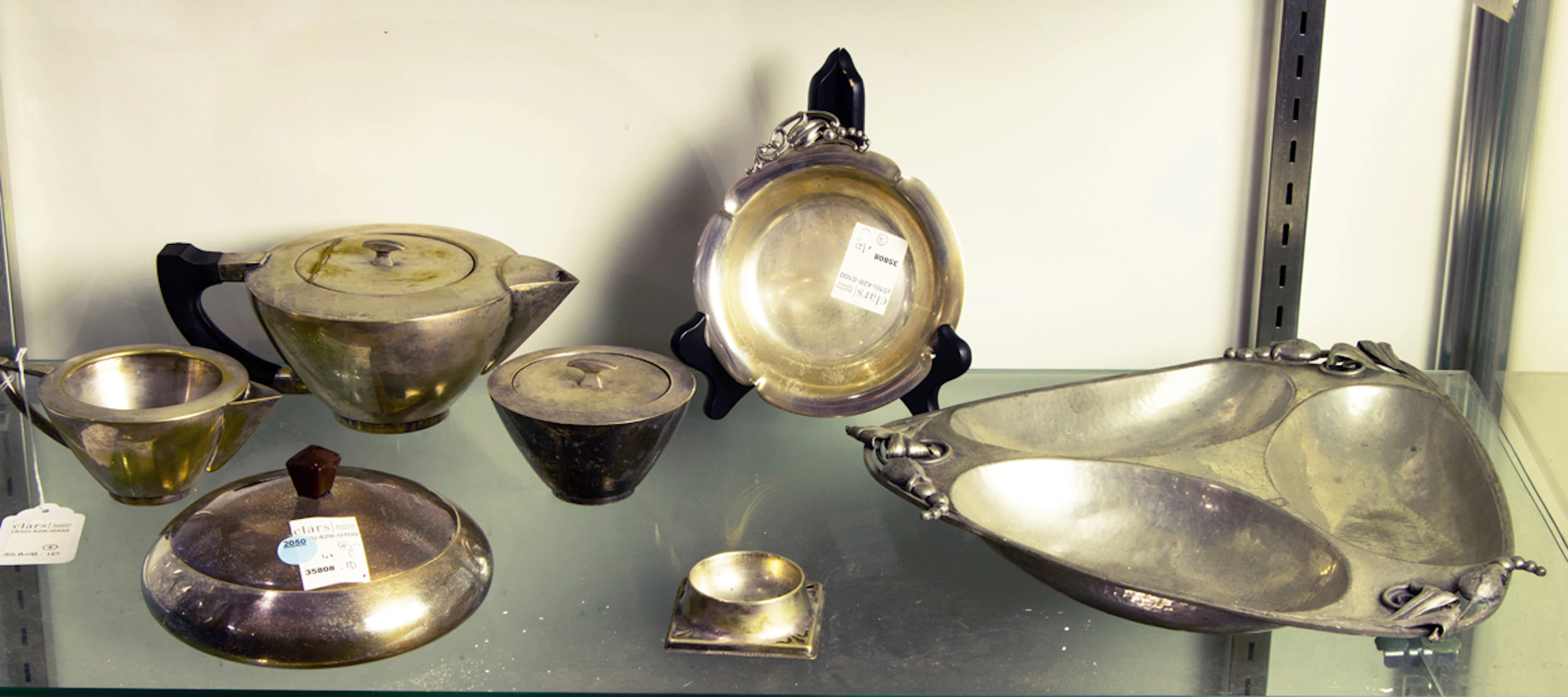 A group of mainly Art Deco silver plated table articles