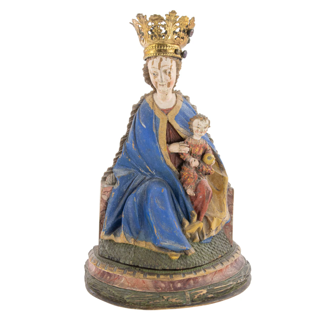 A Continental polychrome carved figure of the Madonna and Child