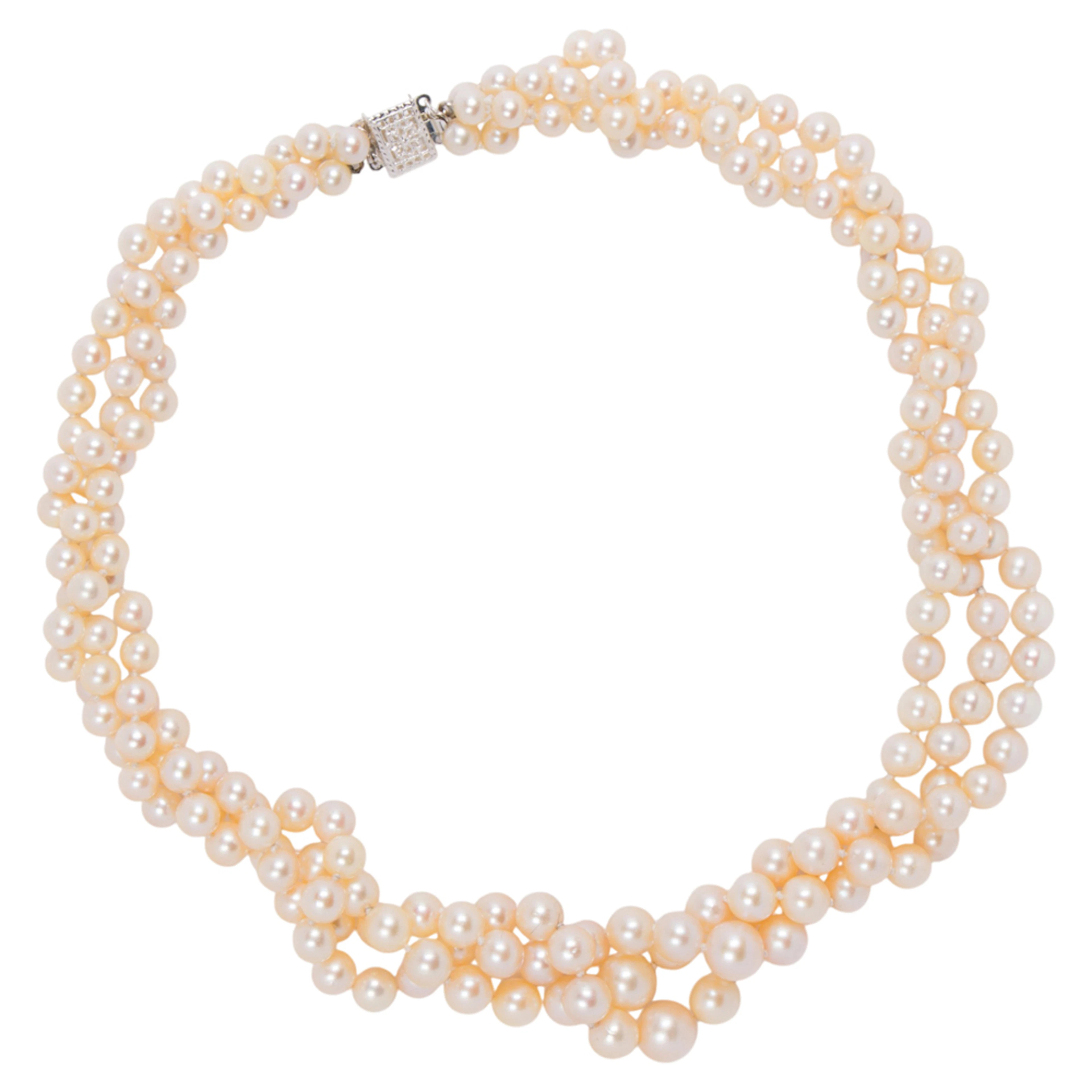 A cultured pearl and silver necklace