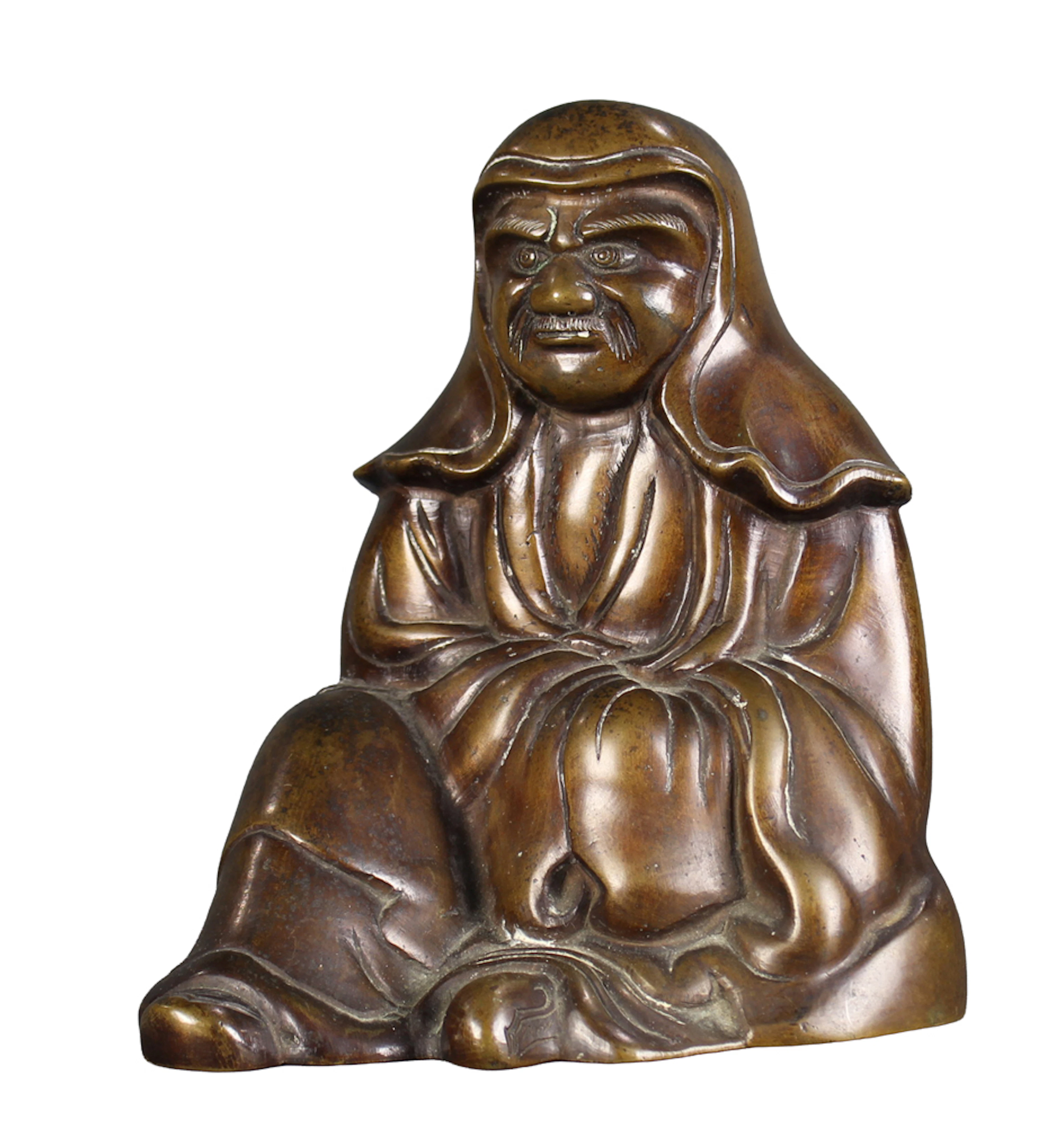 A Japanese bronze figure