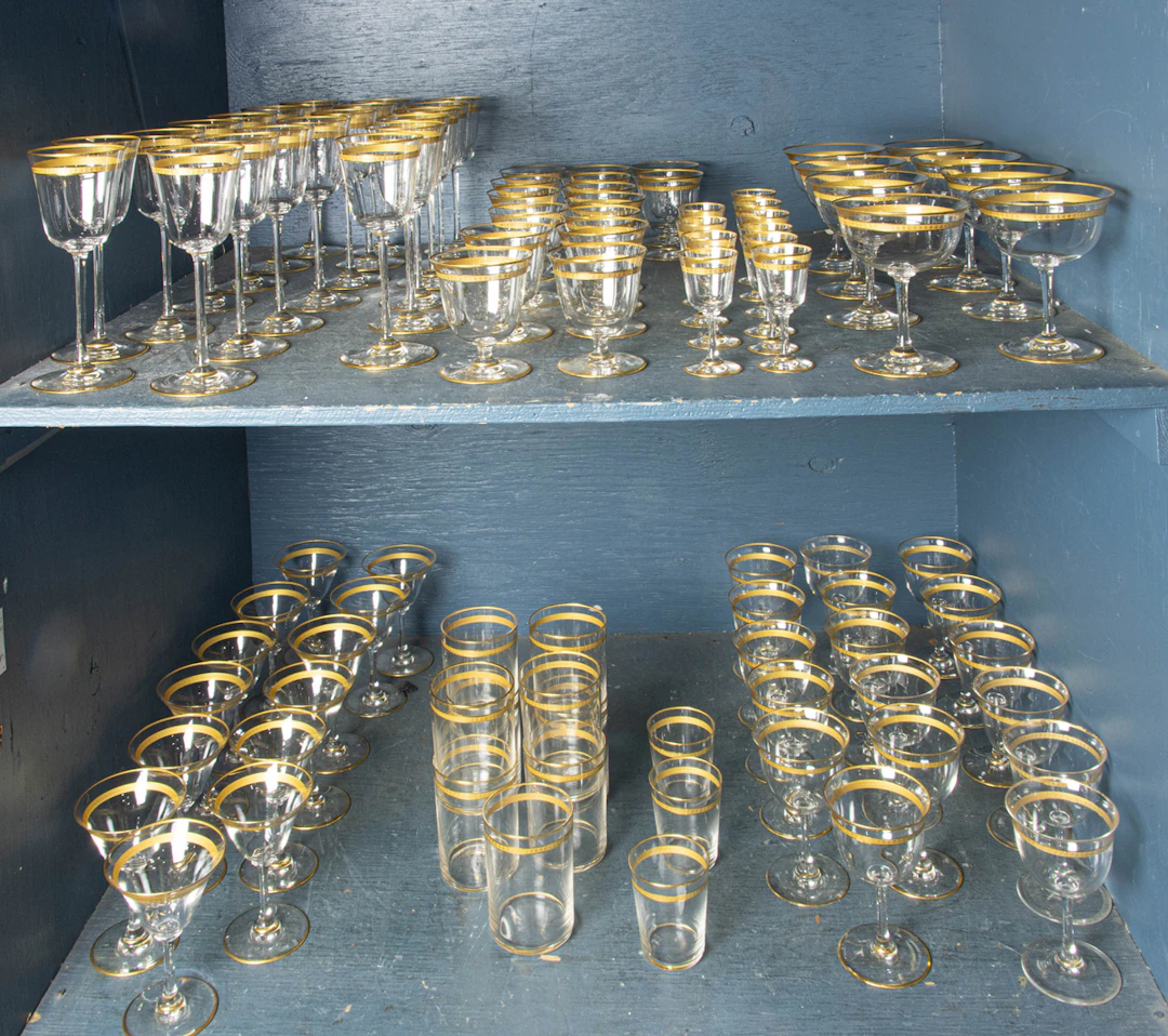 An American gilt rimmed glass suite of stemware
