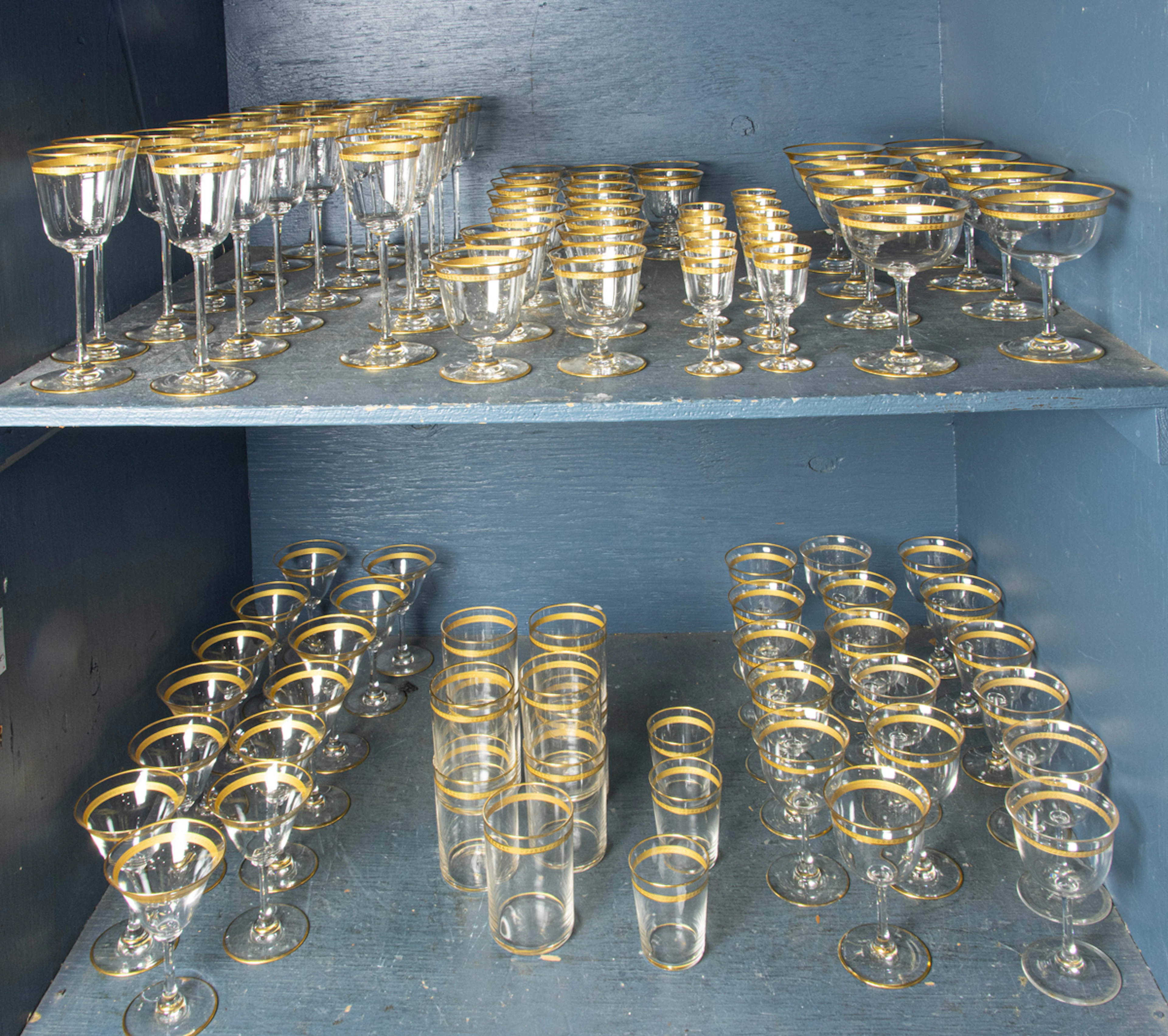 An American gilt rimmed glass suite of stemware