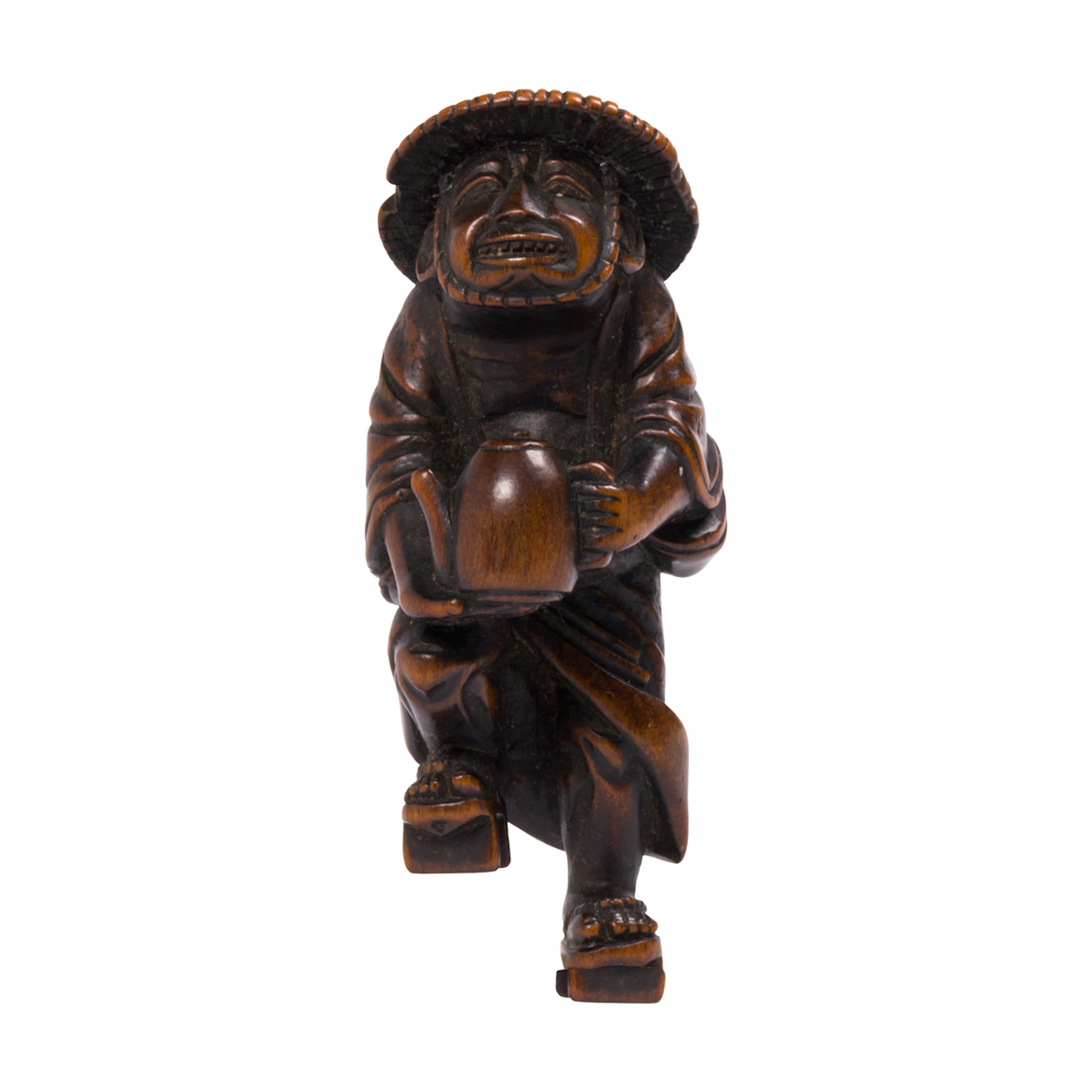 A boxwood netsuke of the oil thief Abura Bozo