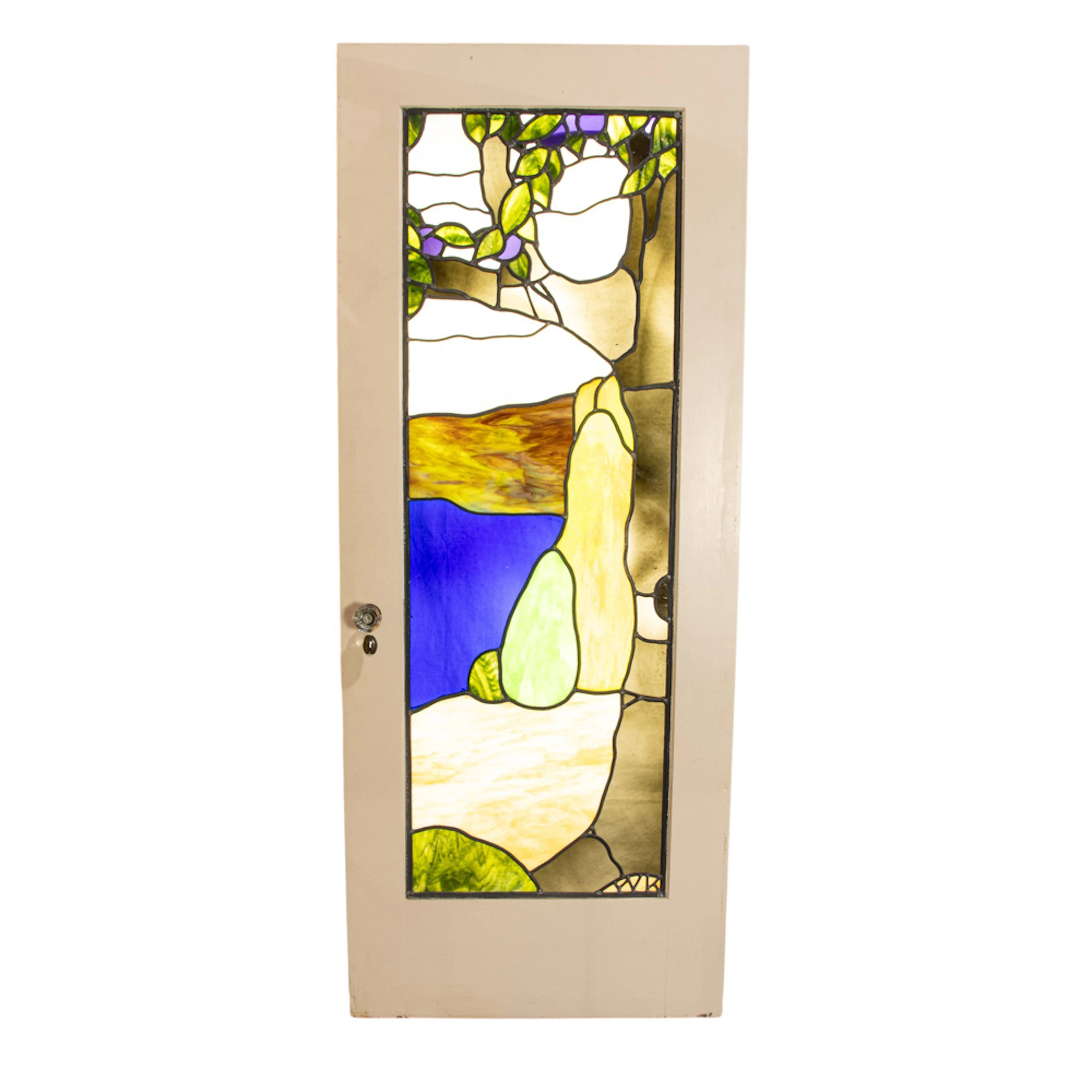 An Arts and Crafts Wilder Bentley leaded glass door original to Frederickson