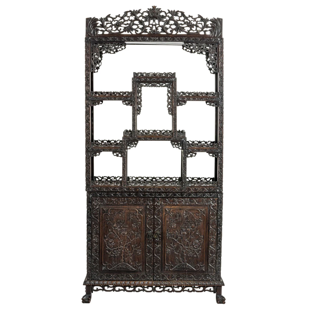 A Chinese export two-part hongmu display cabinet