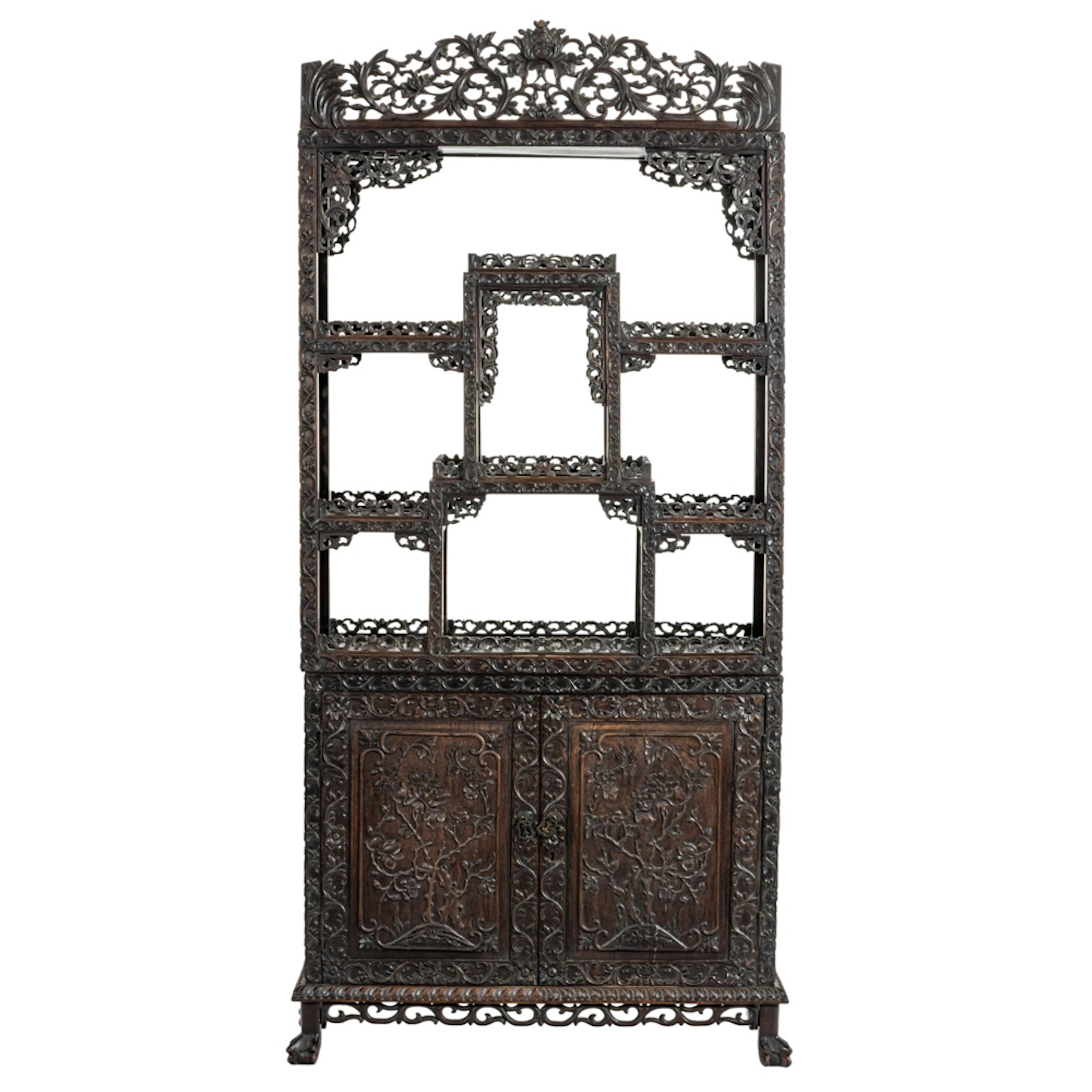 A Chinese export two-part hongmu display cabinet