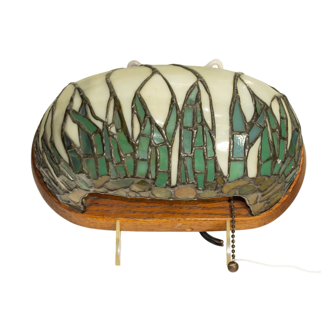 An Arts and Crafts style leaded glass wall light