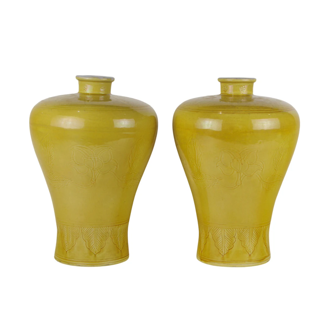 A pair of Chinese yellow glazed and incise-decorated meiping vases