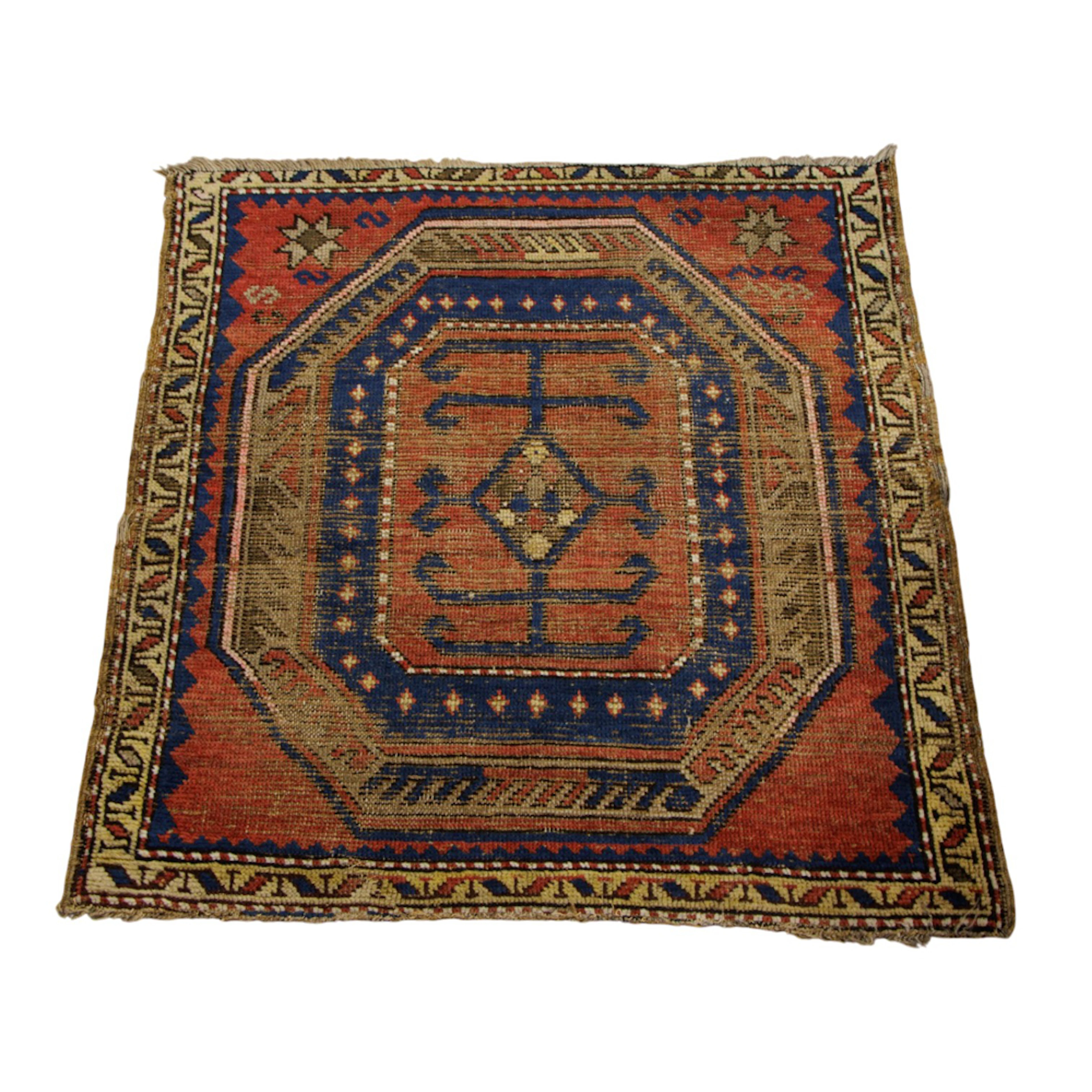 An antique Caucasian Kazak carpet
