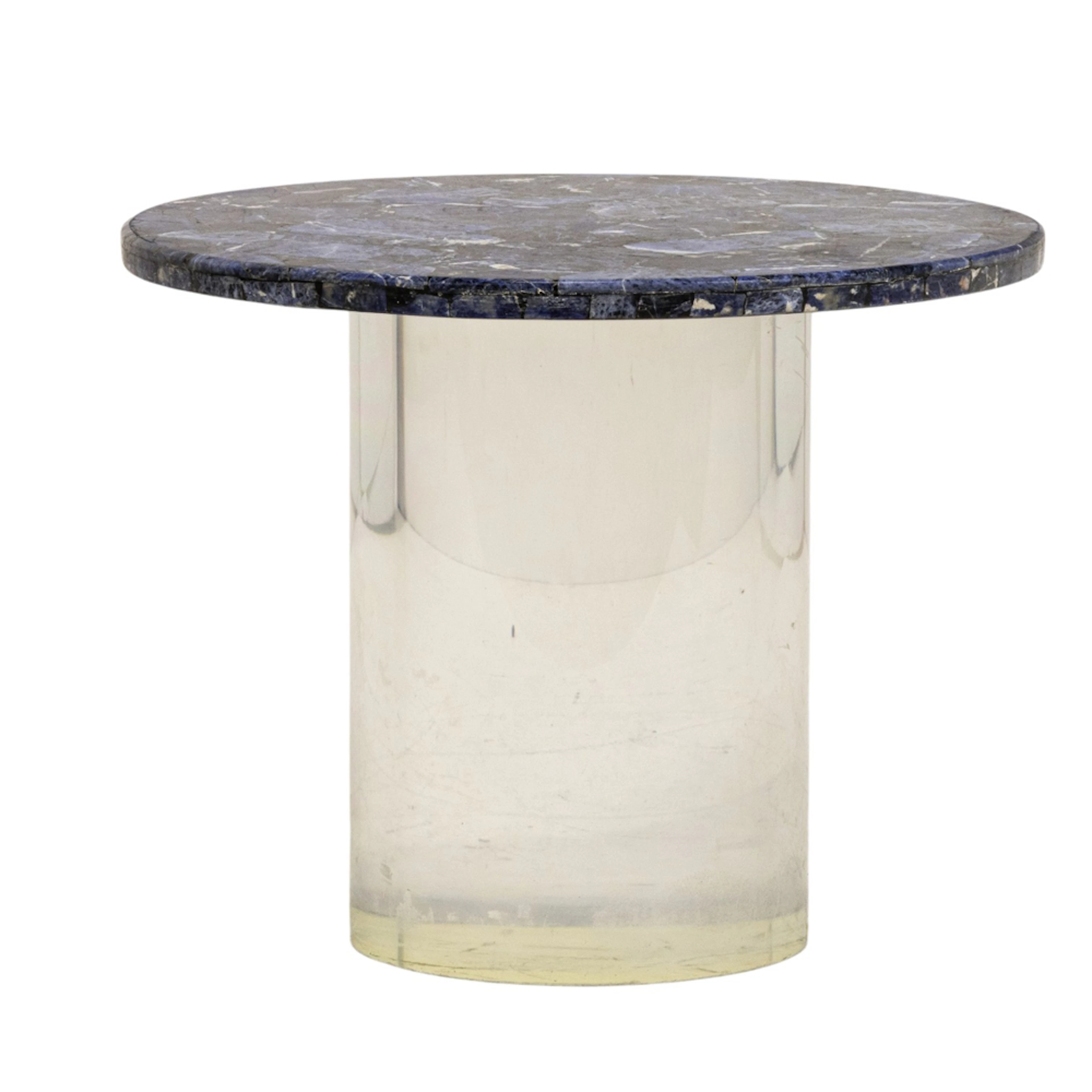 A marble top acrylic table