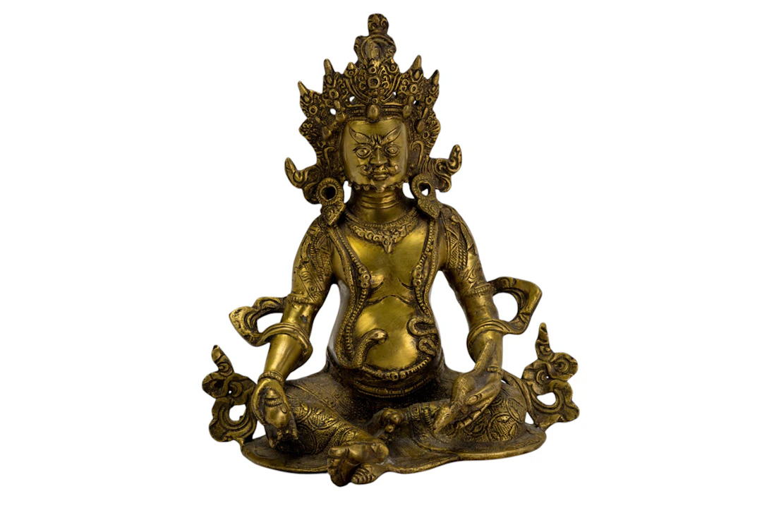 A Tibetan bronze figure of Jambhala