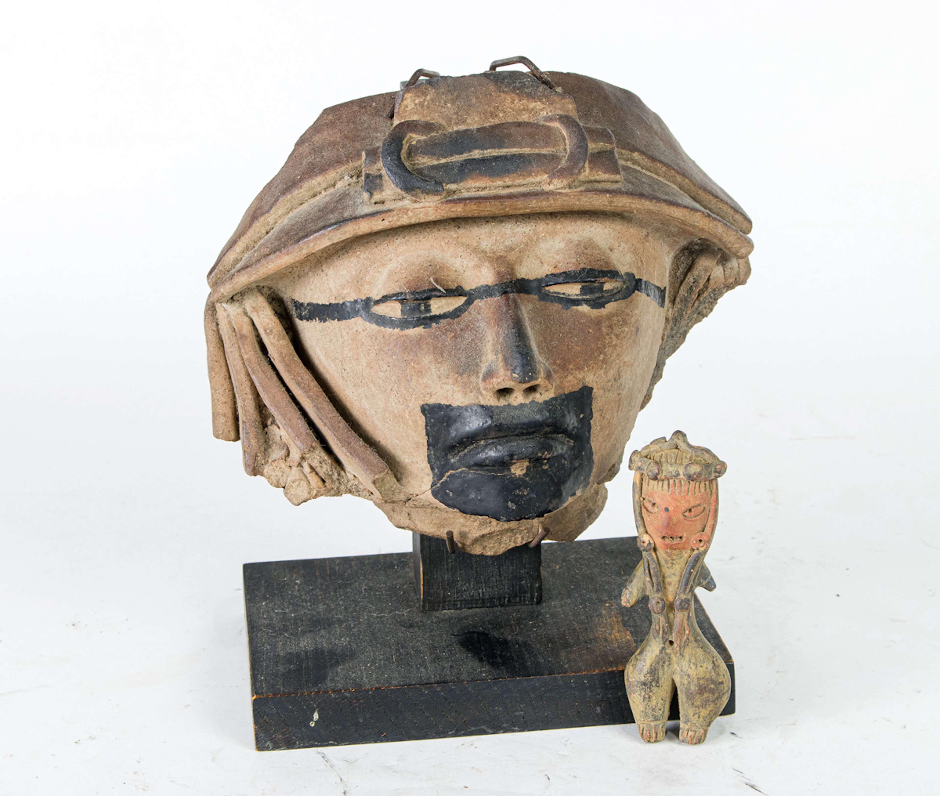 Two Precolumbian terracotta artifacts