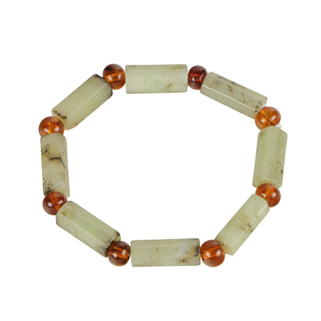 A Chinese white jade and amber bracelet