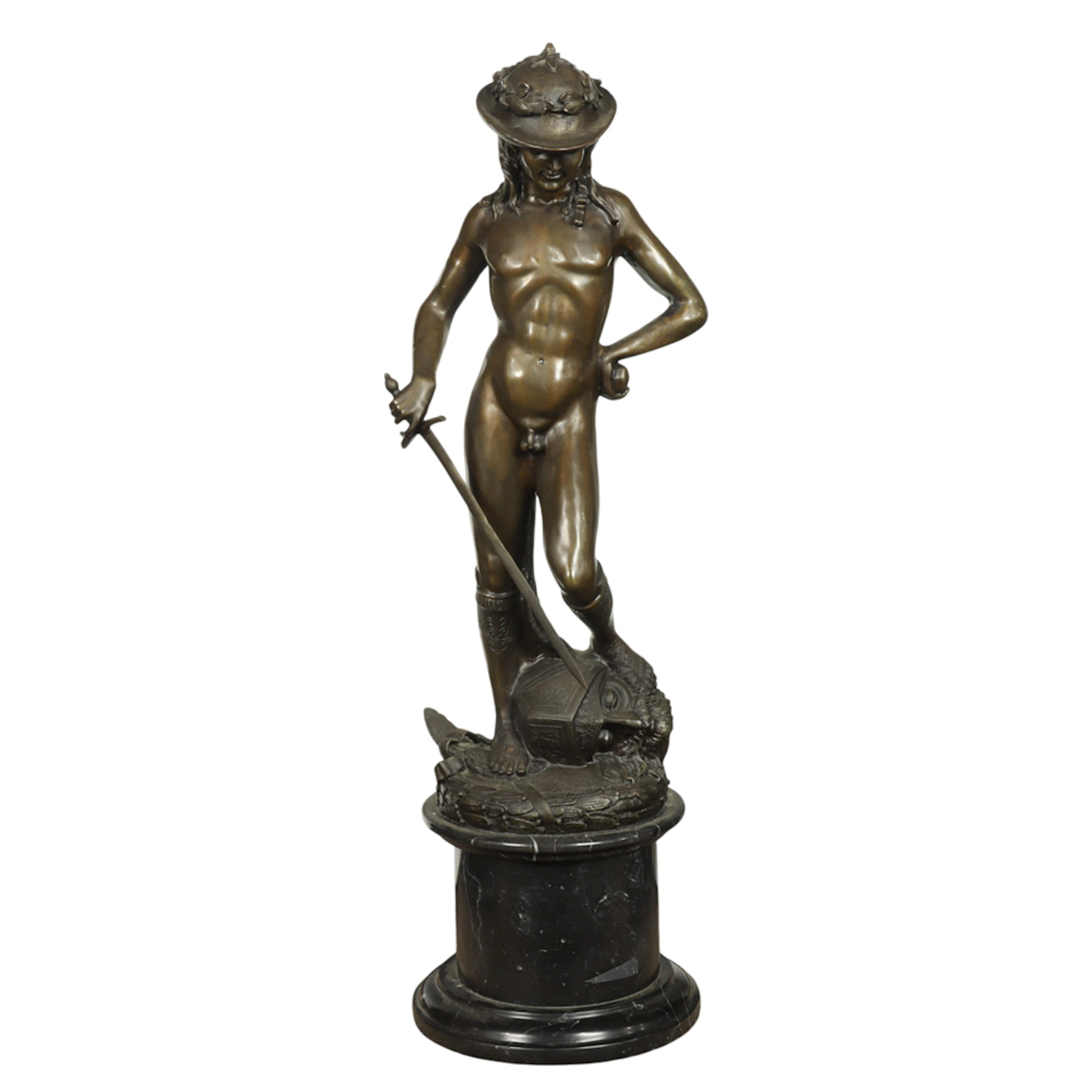 A Renaissance style patinated bronze figure of David