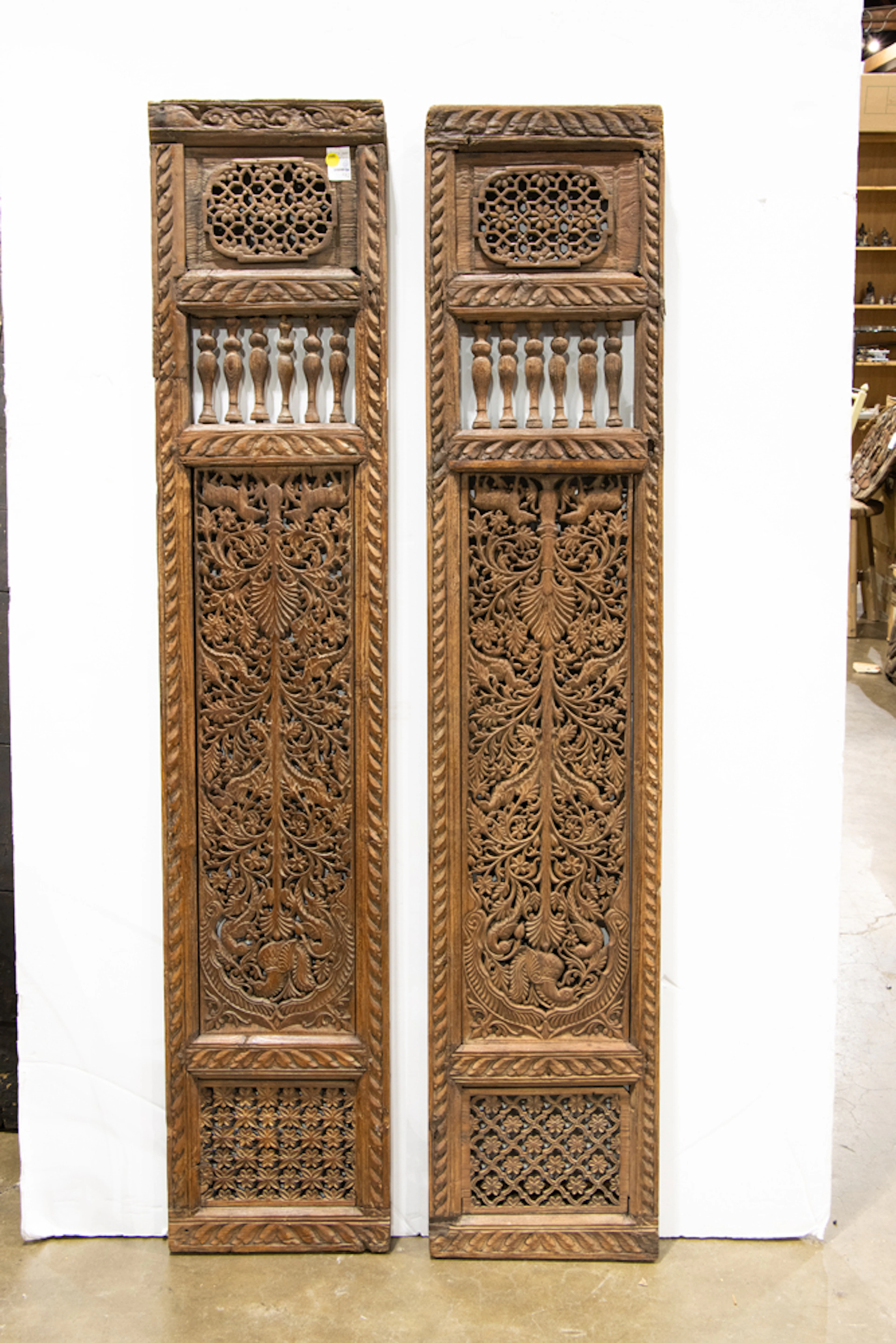 A pair of Indian carved wood windows