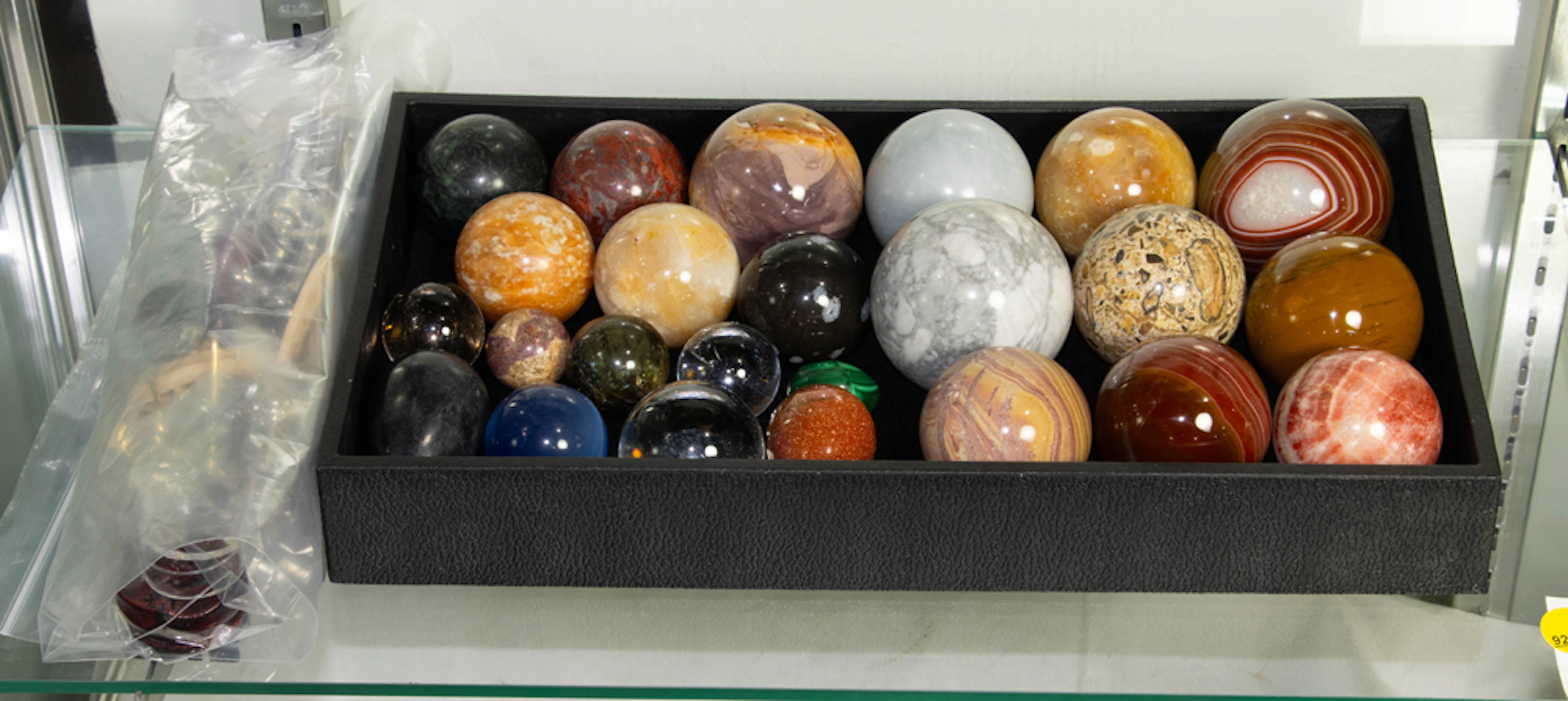 A collection of mainly twenty-one stone spheres