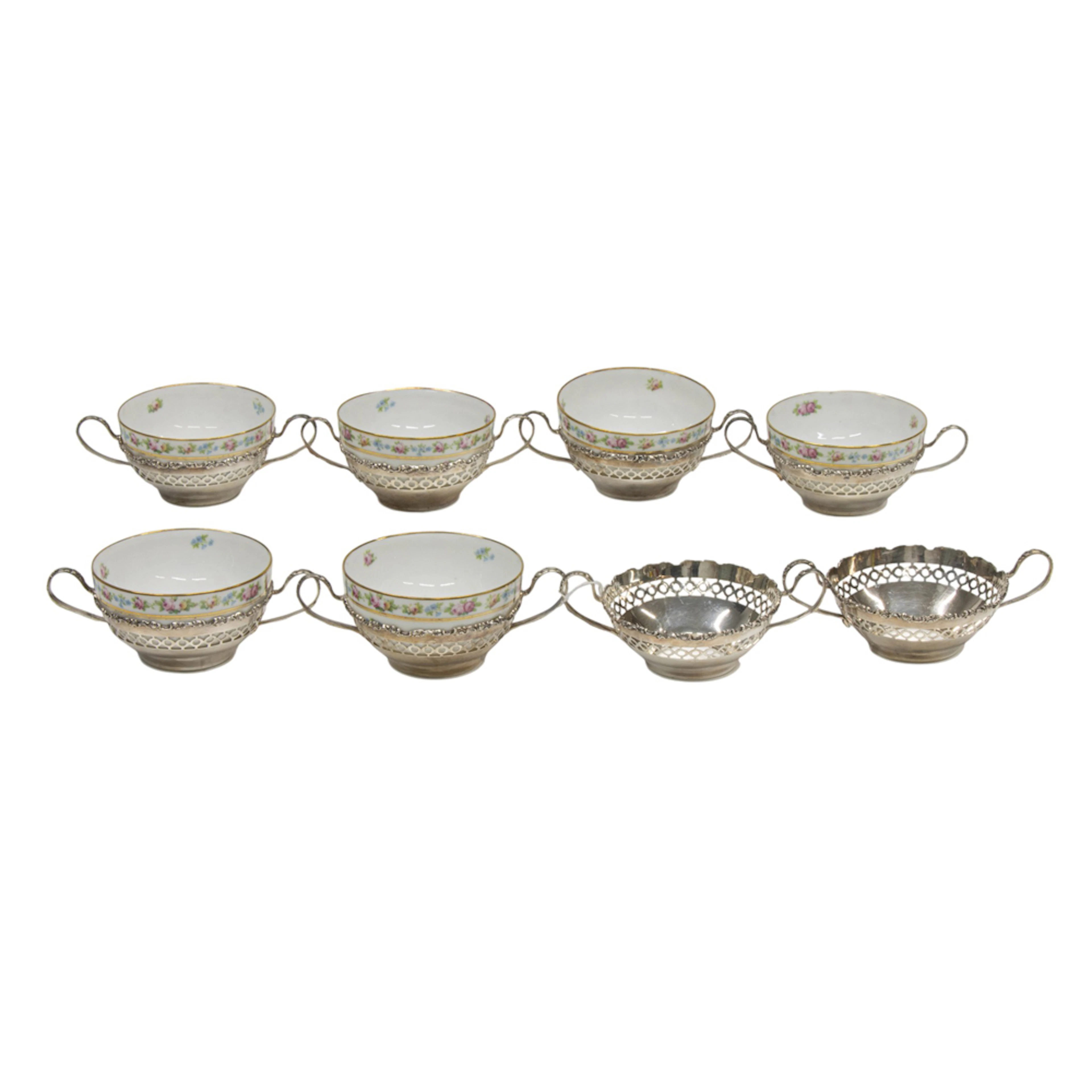 A set of eight sterling reticulated bouillon cup frames, Shreve & Co