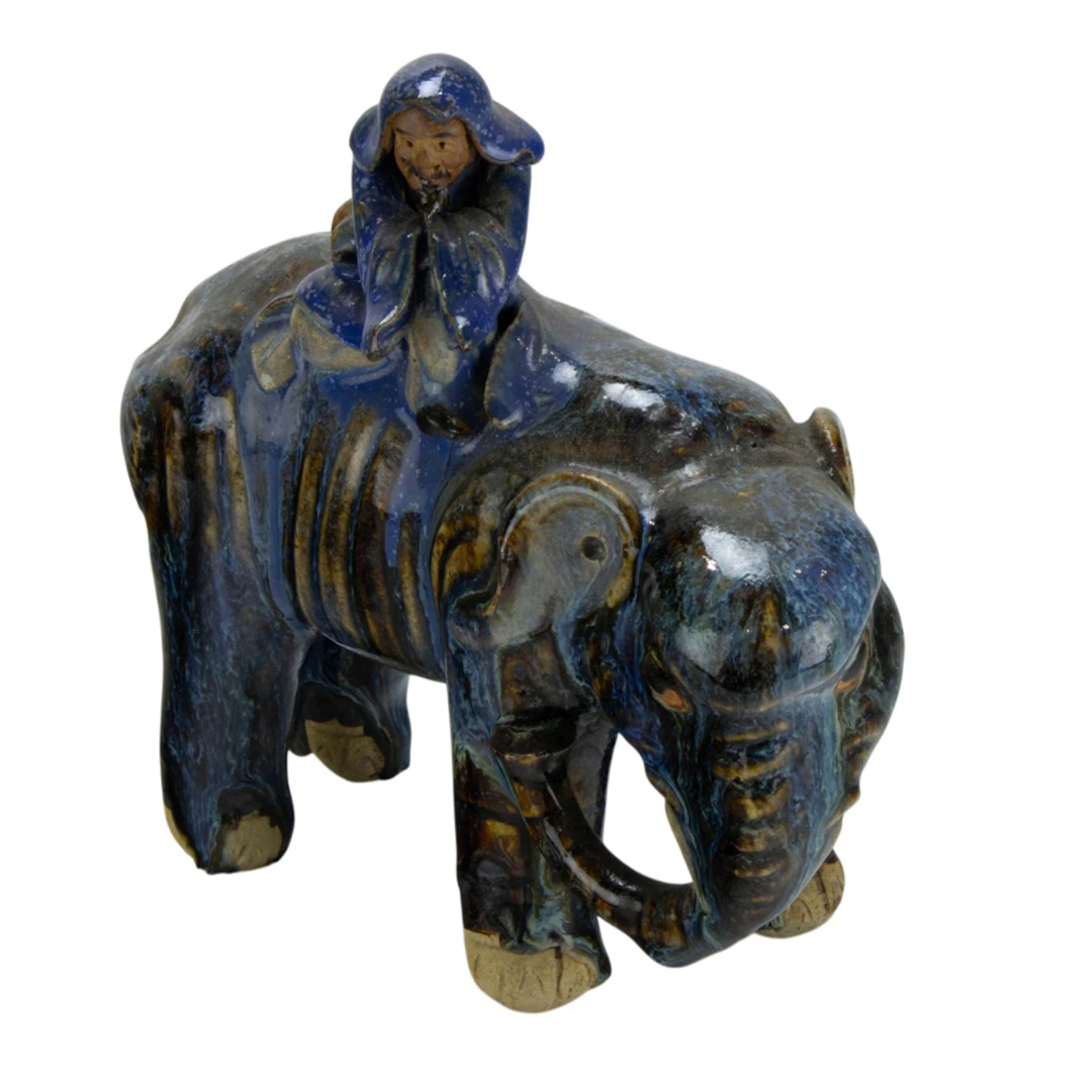 A Chinese Shiwan figure of a luohan