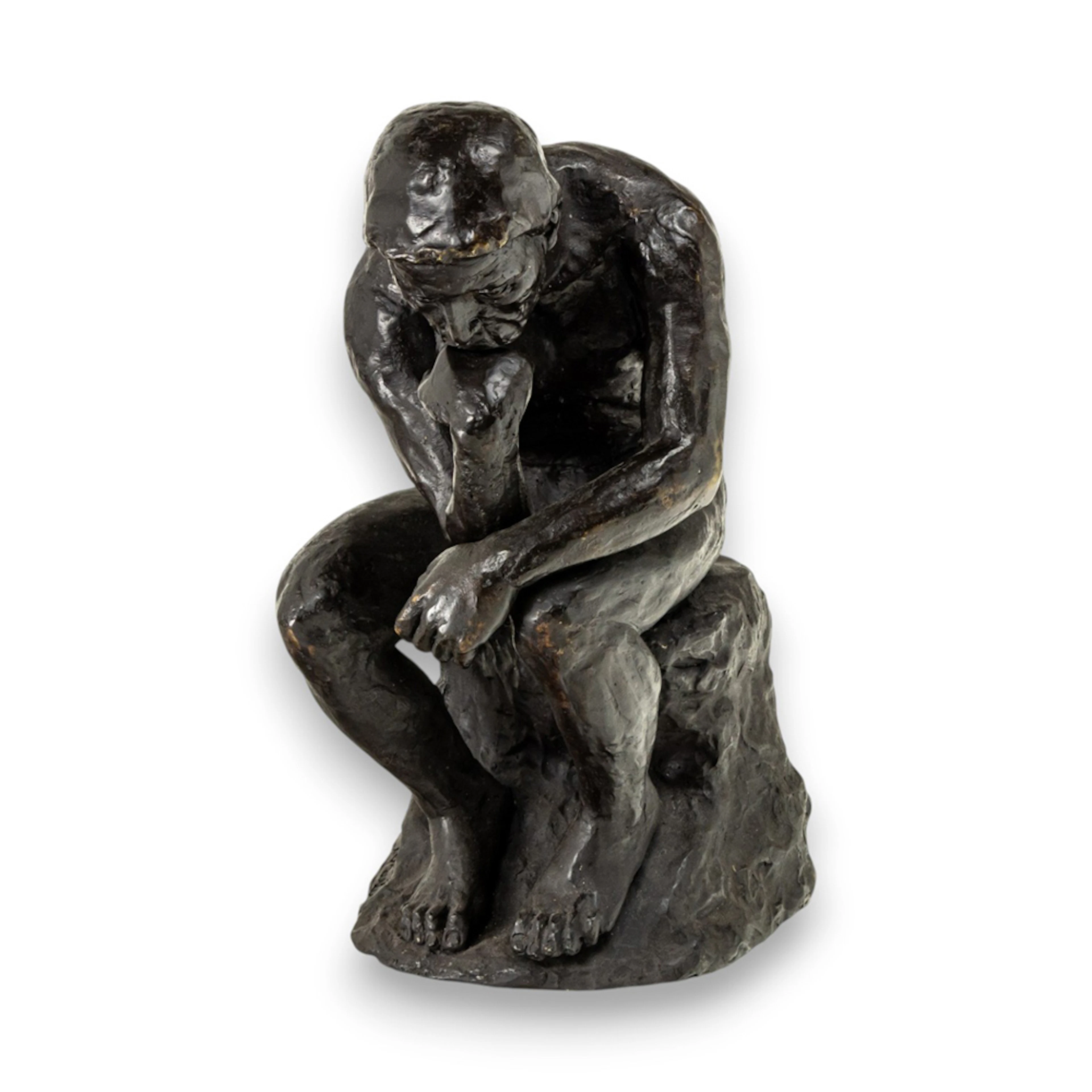 A patinated bronze figure of The Thinker