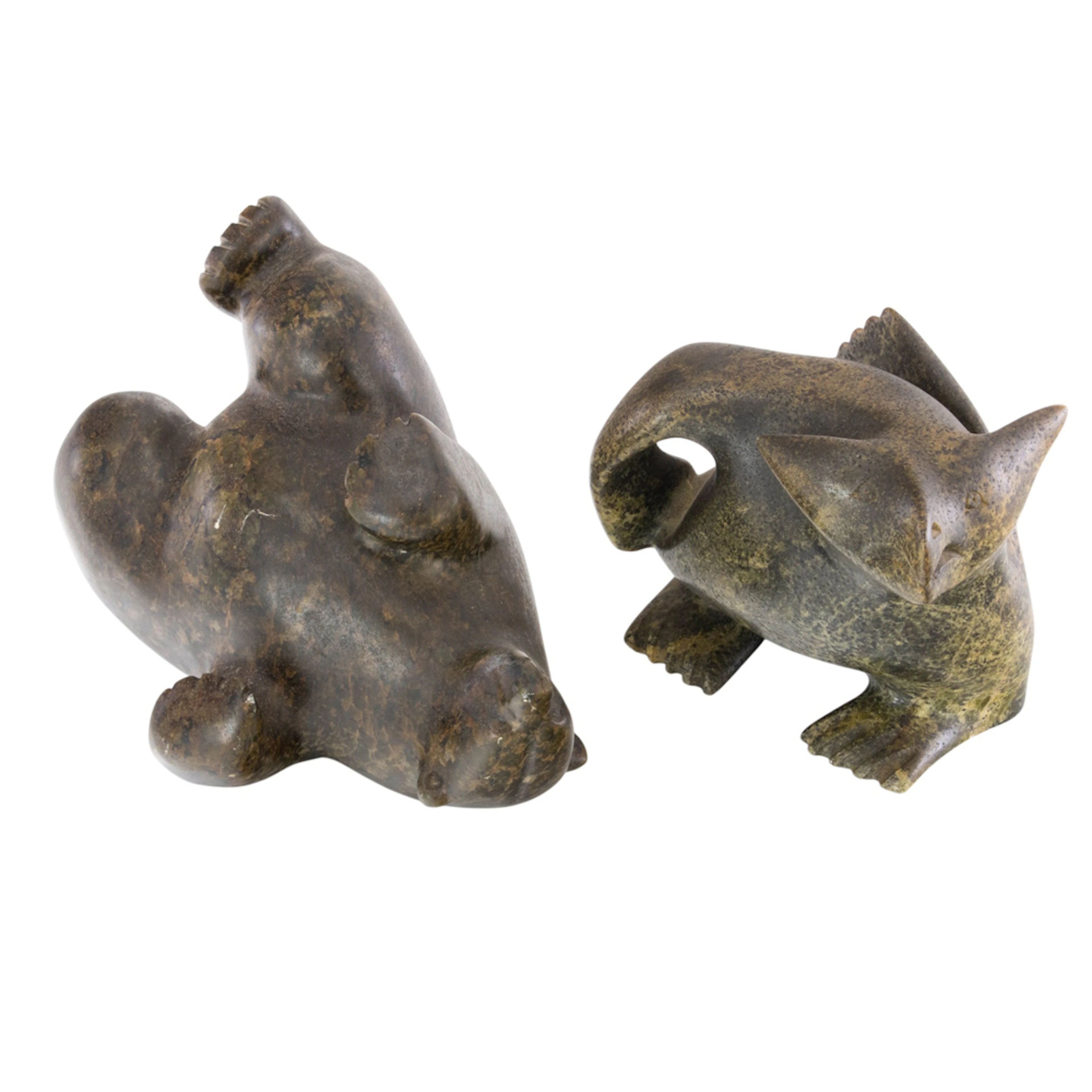 Two Inuit carved stone animals