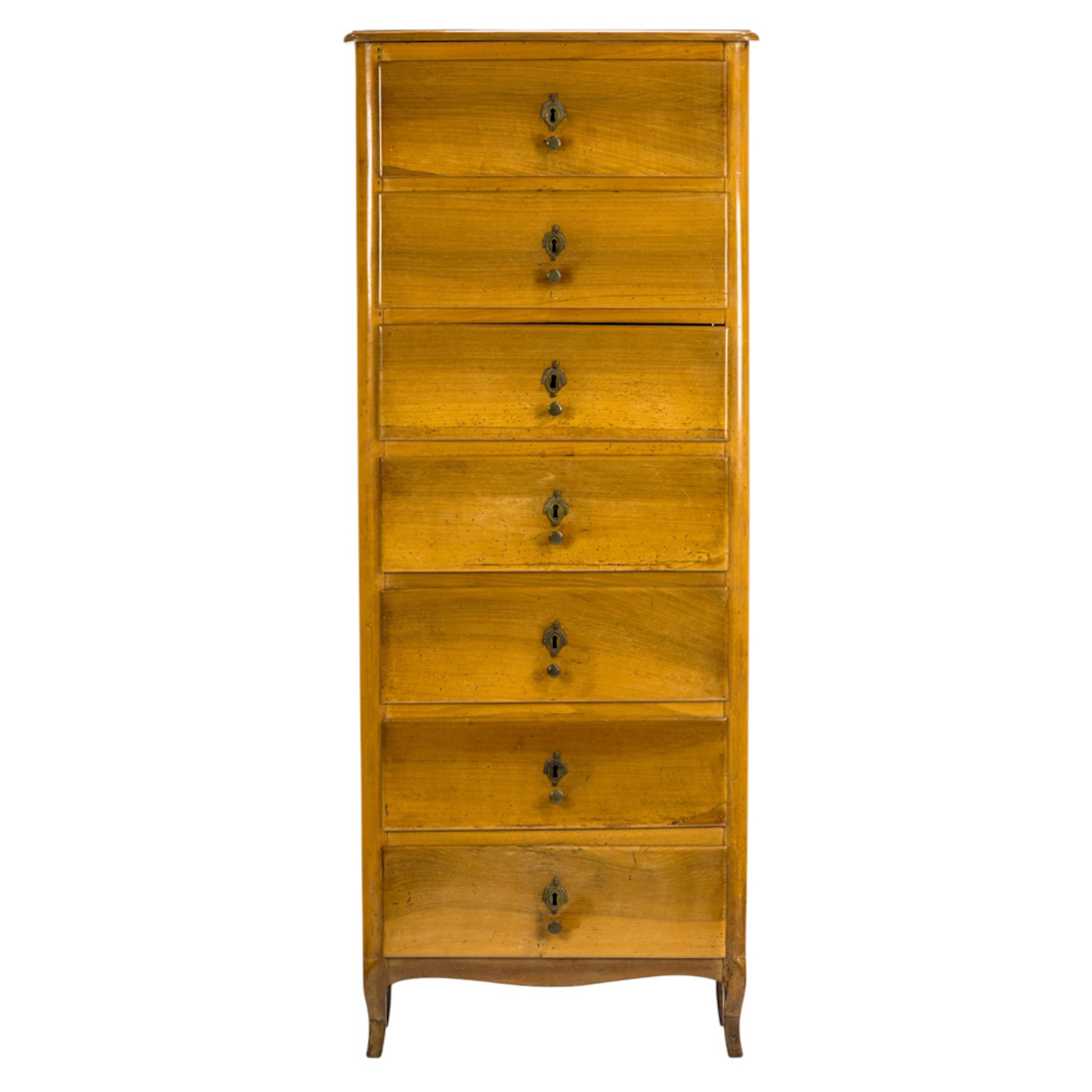 A Louis XV Provincial lemon wood semainier