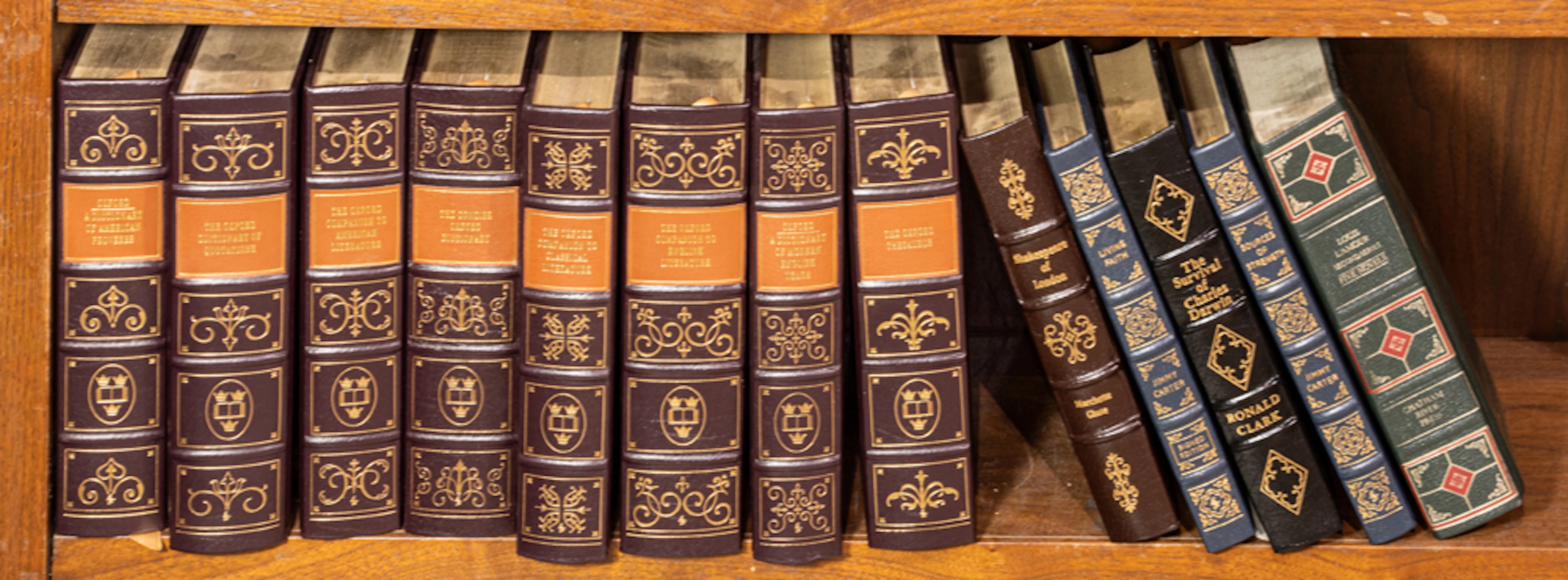 An assembled group of leather bound Easton Press Oxford companion