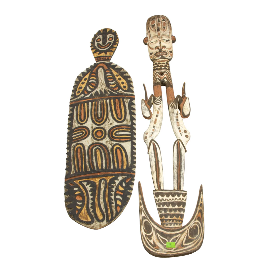 A Papua New Guinea carved board and figure
