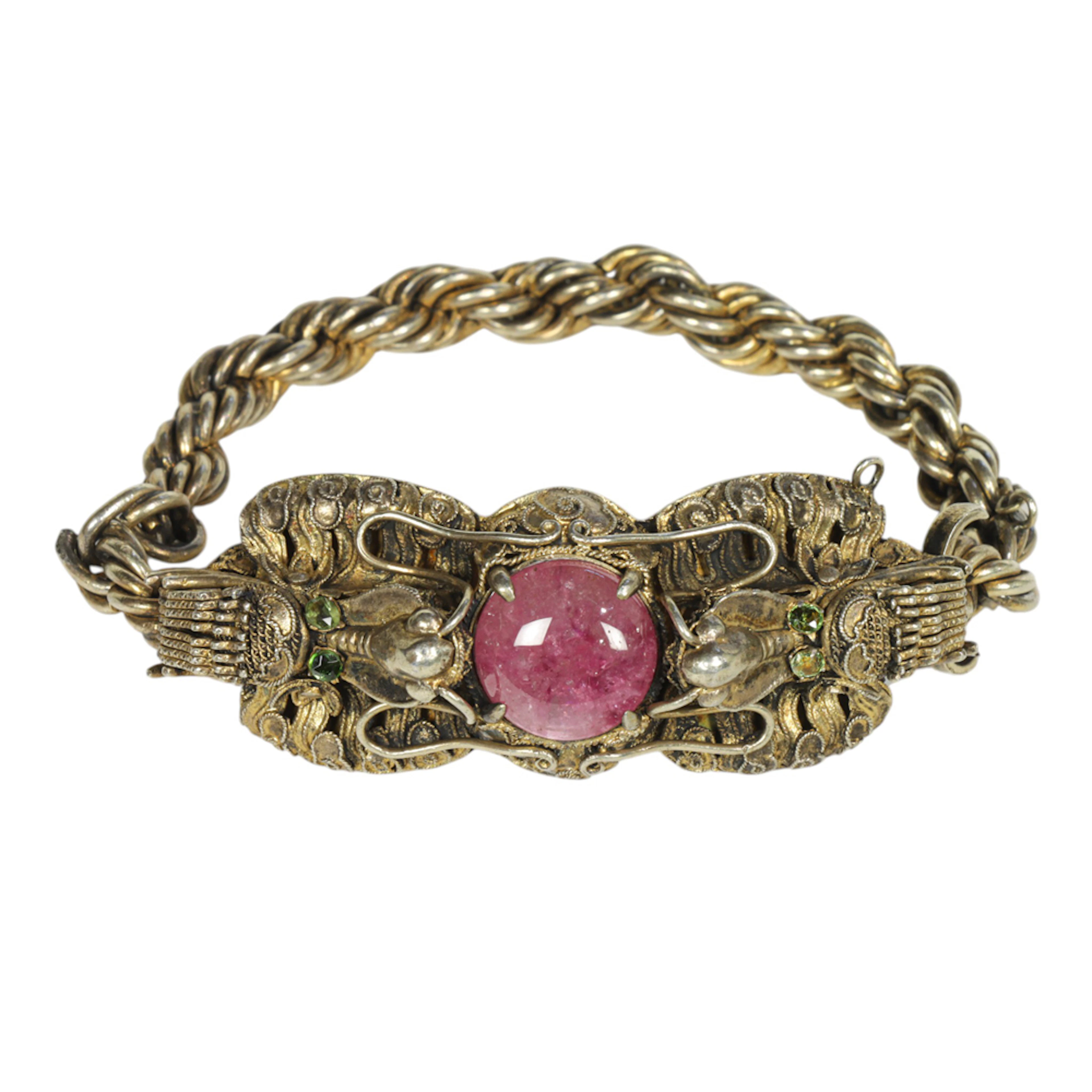 A Chinese gilt silver filigree and pink tourmaline 'dragon' bracelet