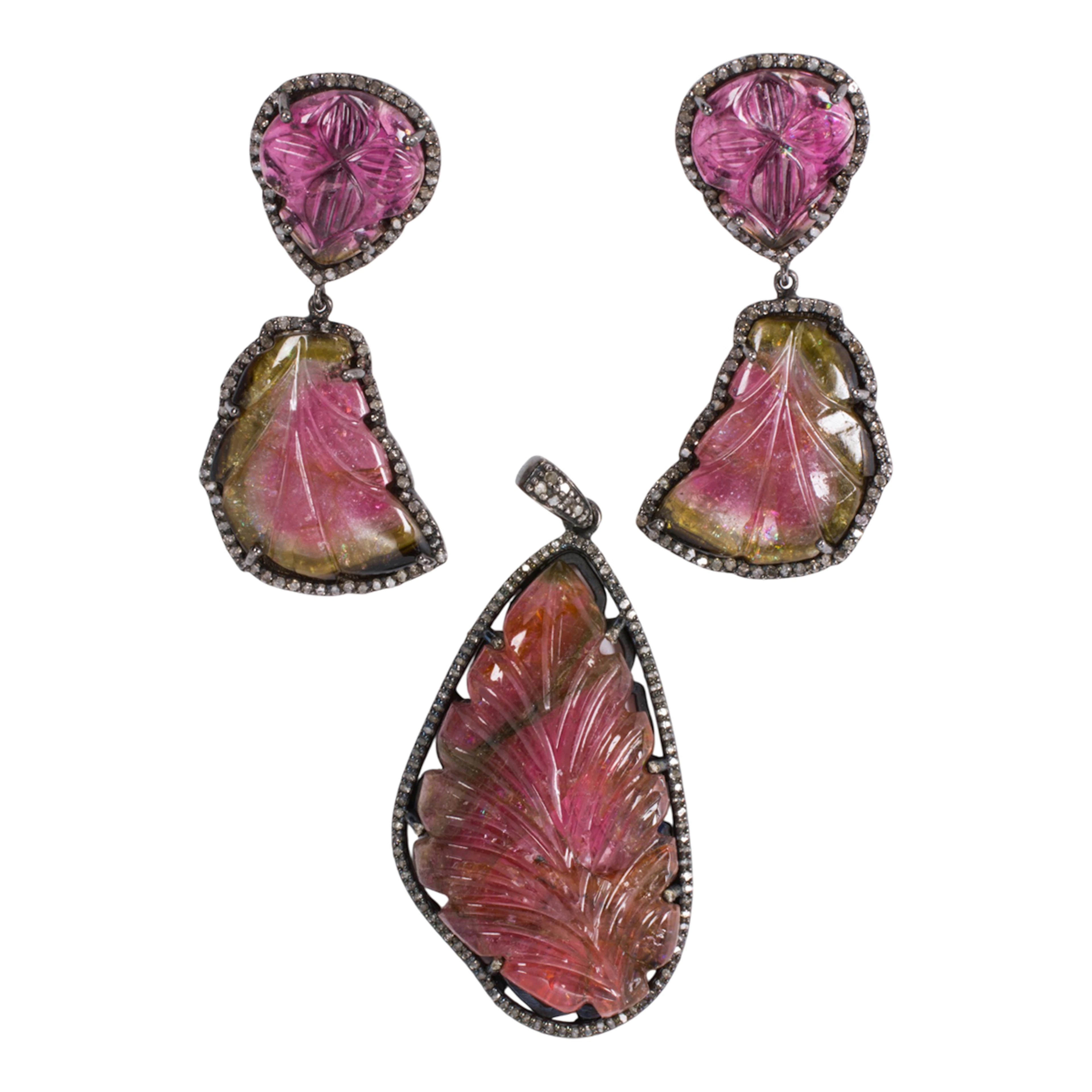 A tourmaline, diamond, blackened silver, and 14k gold pendant and earrings set