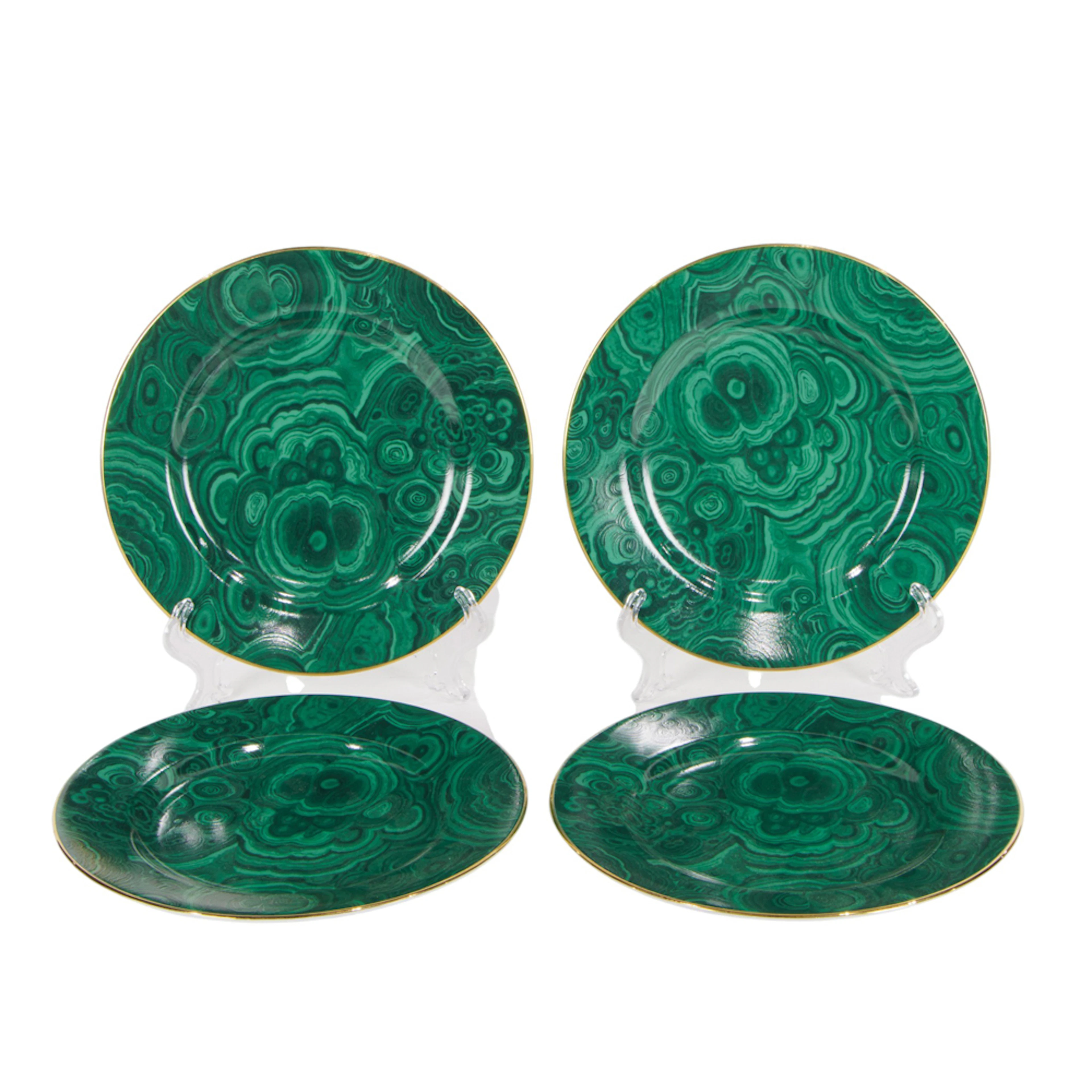 Four Neiman Marcus porcelain plates in a malachite pattern