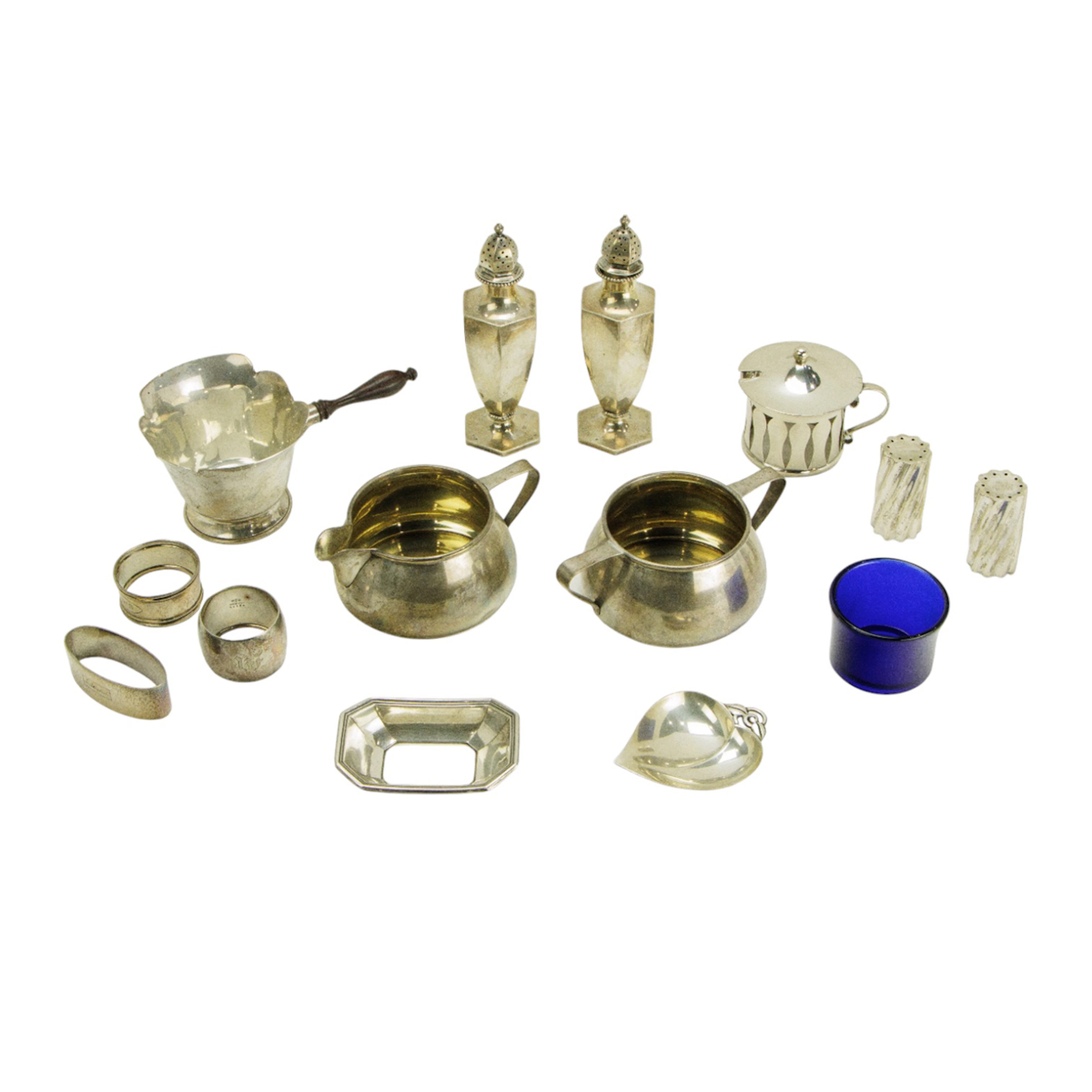 A group of sterling table items