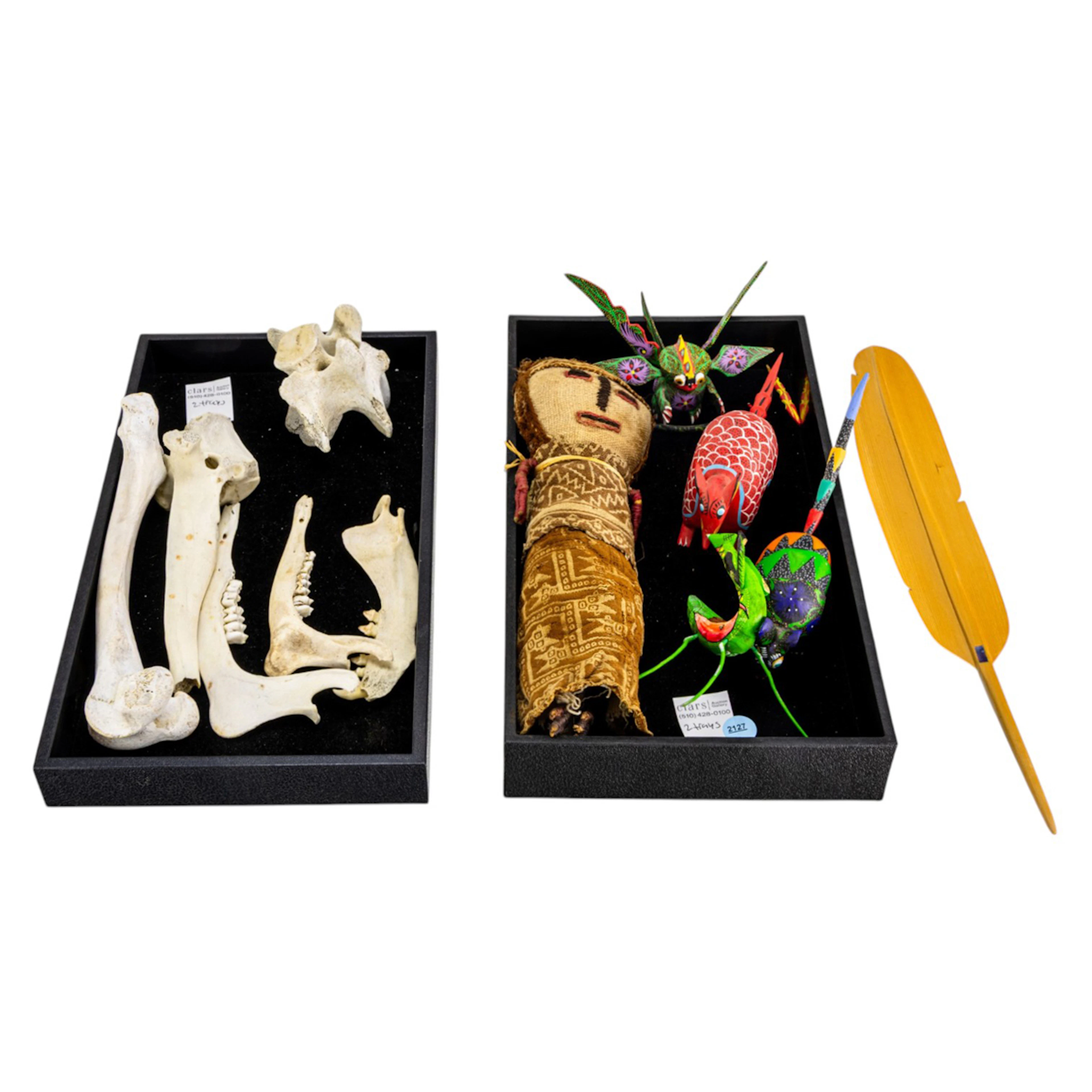 An assembled group of wood sculptures and Chancay doll