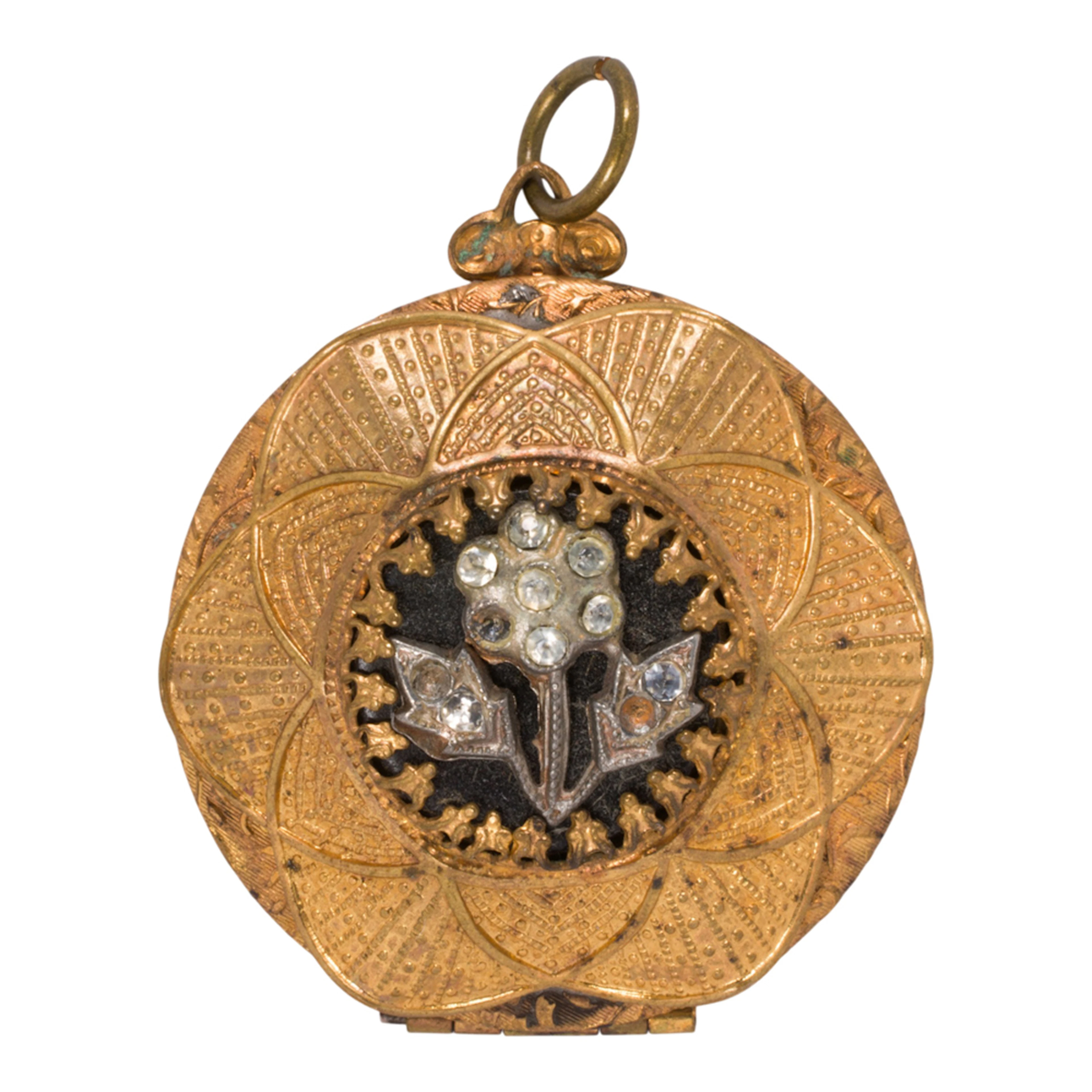 A gold-tone locket