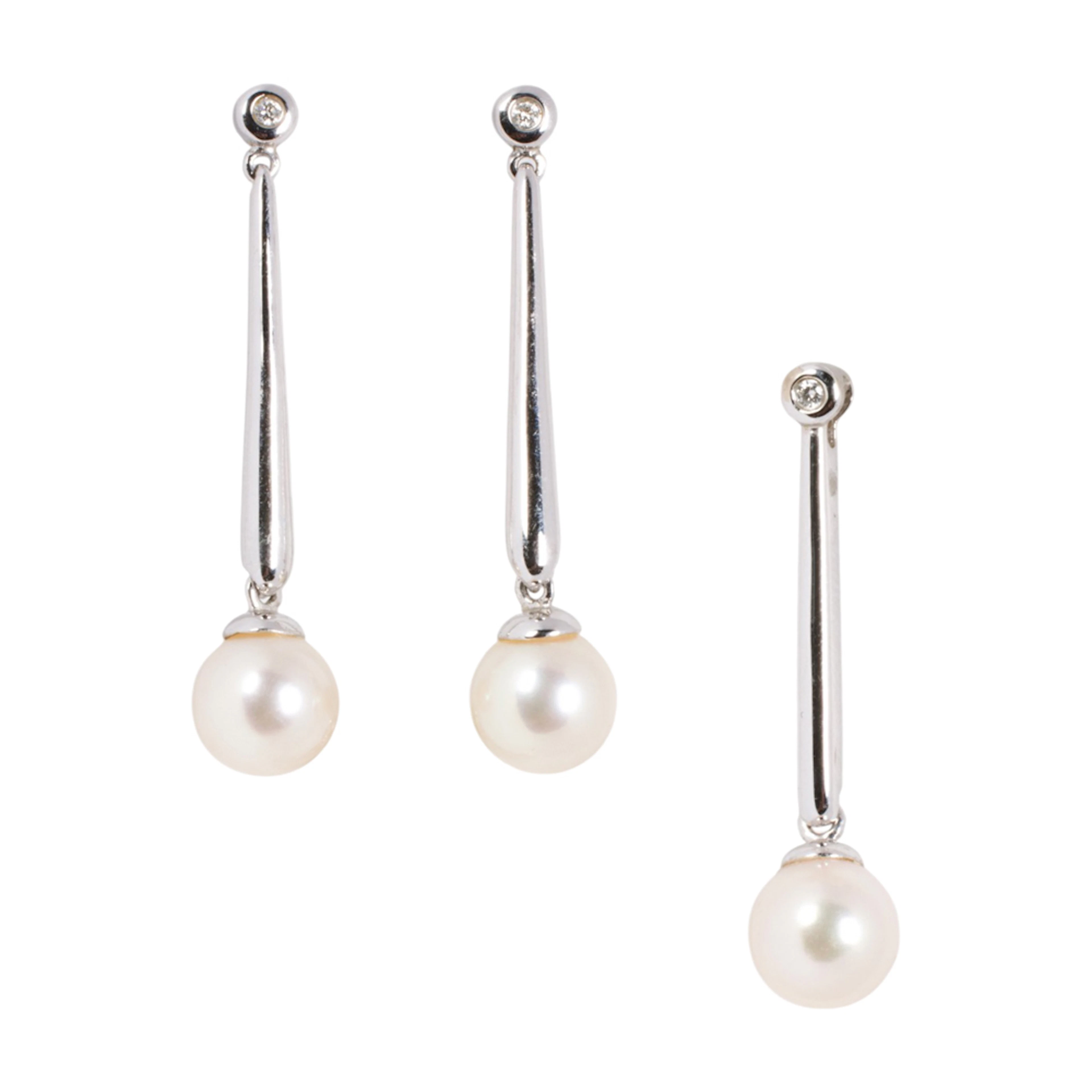 A cultured pearl and 14k white gold earrings and pendant set