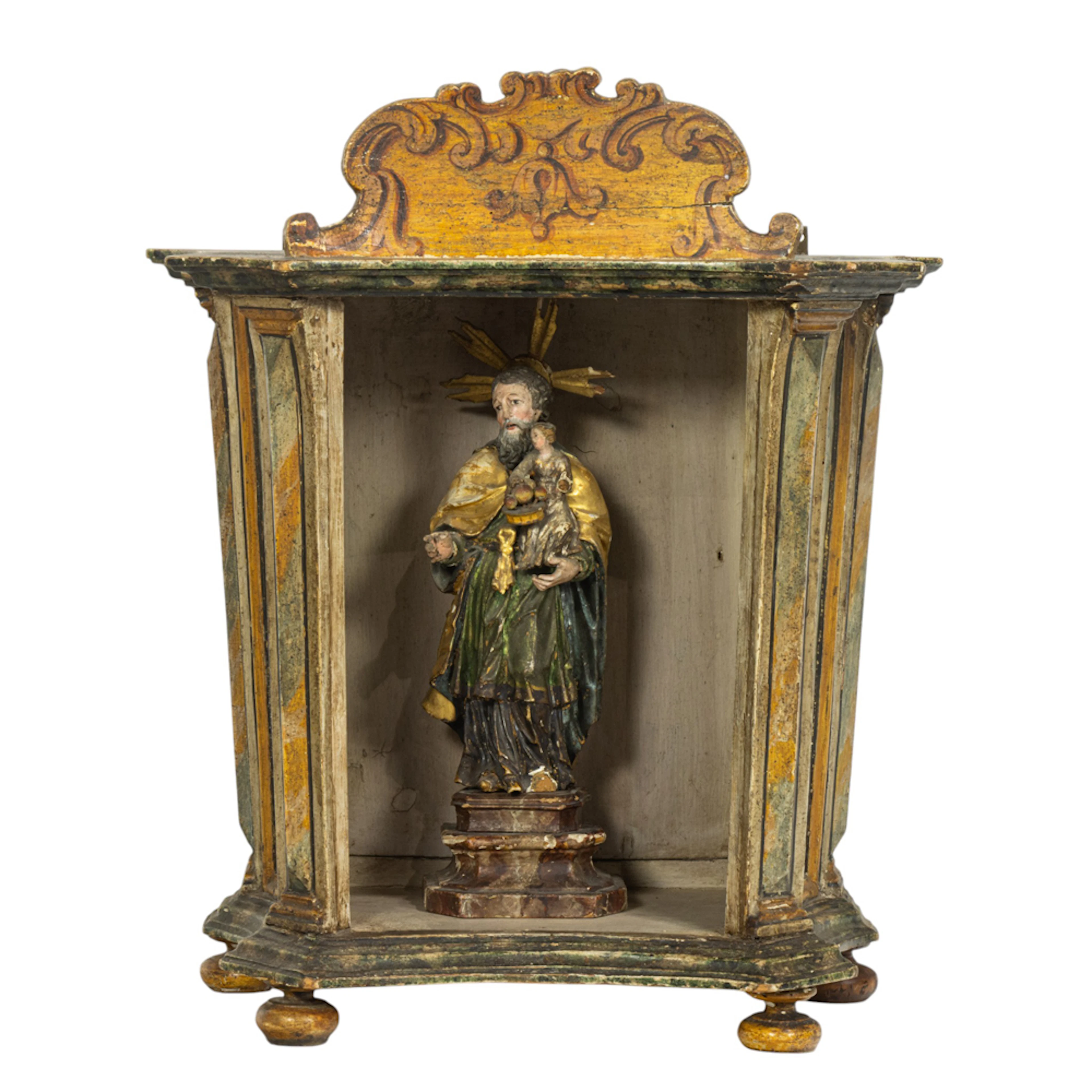 A Continental polychrome faux-marbleized niche with saint