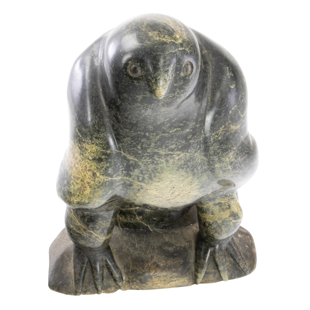 An Inuit carved serpentine hawk