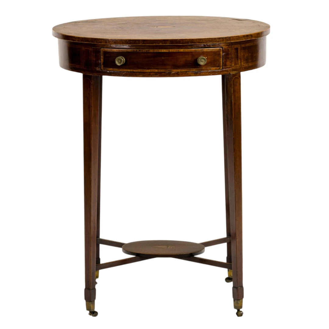 An Edwardian mahogany occasional table