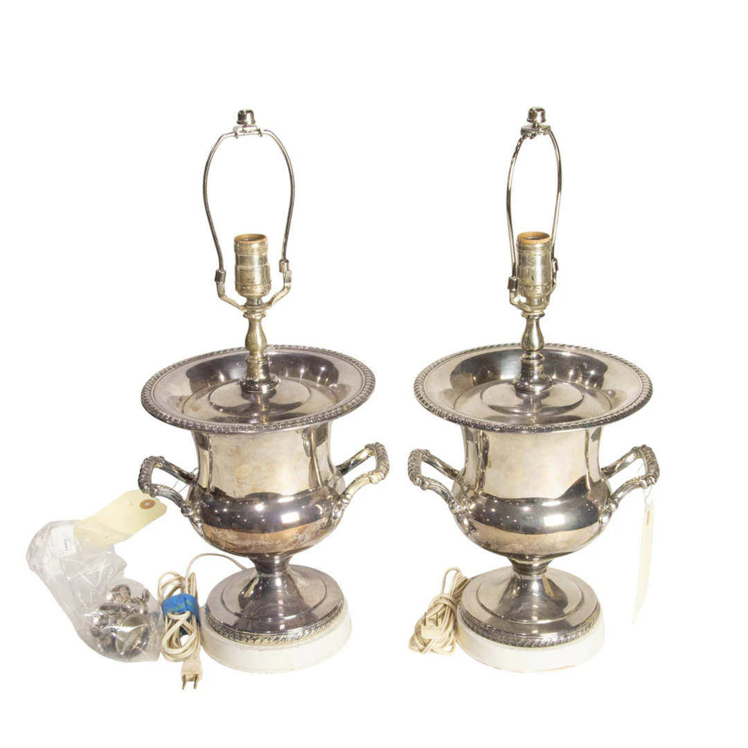 A pair of silver plated champagne bucket urn form lamps