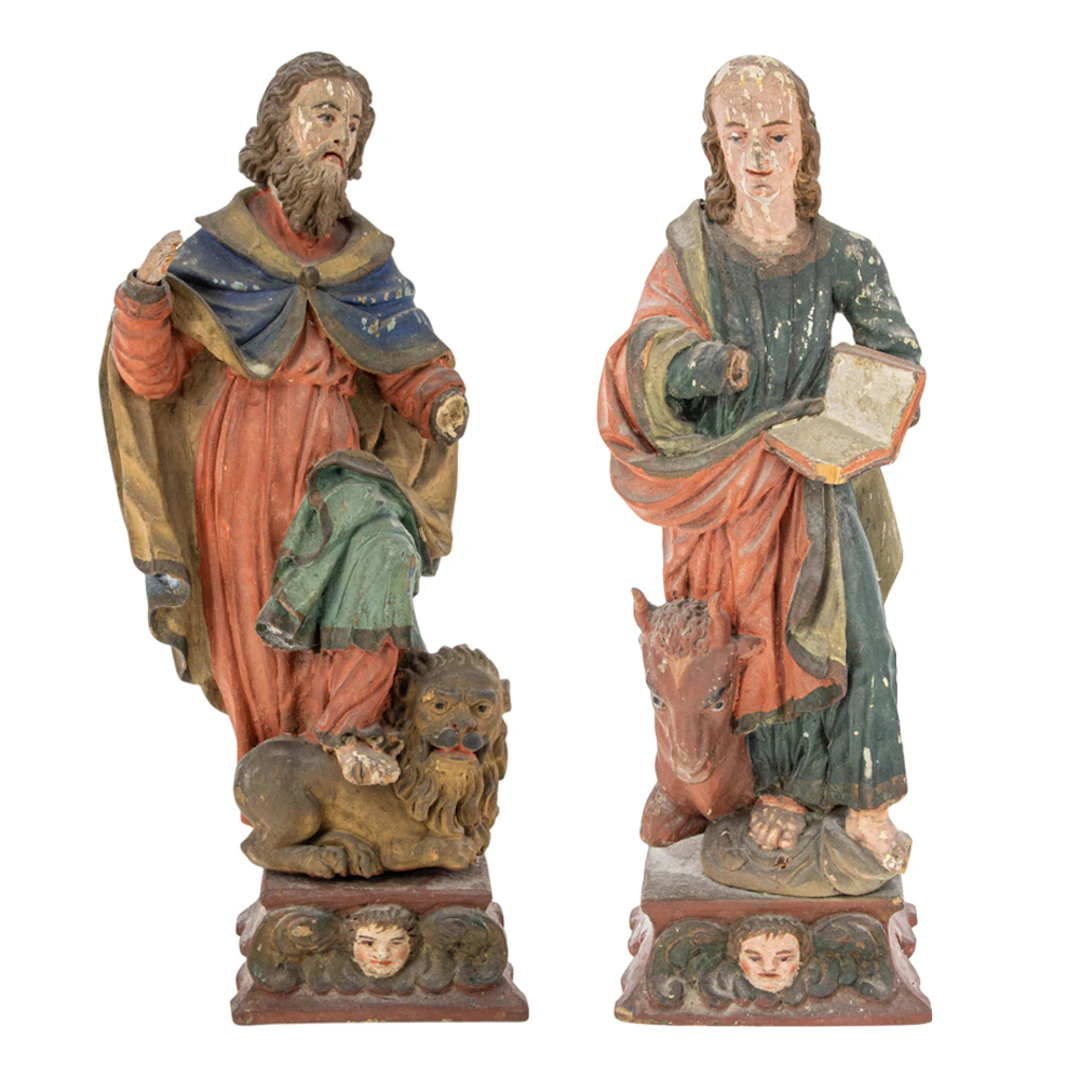 Two Continental polychrome carved wood figures of Saint Mark and Saint Luke