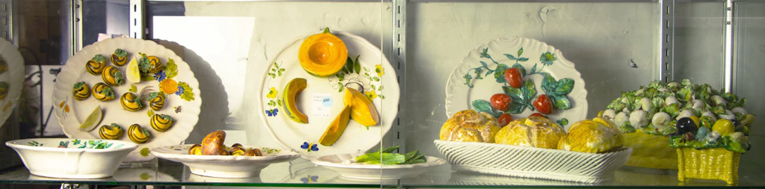 A collection of Italian trompe l'oeil ceramics