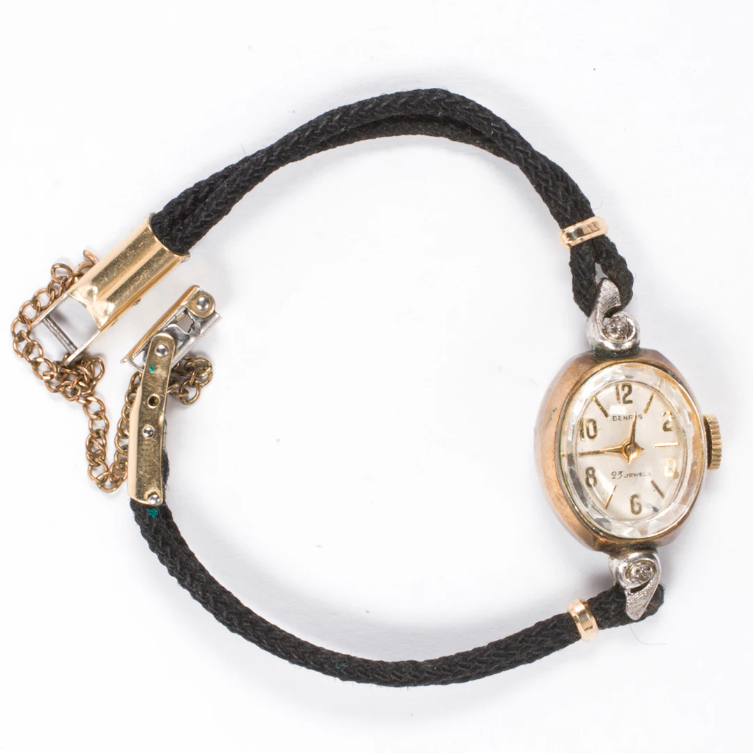 A gold-filled and stainless steel Benrus cocktail watch