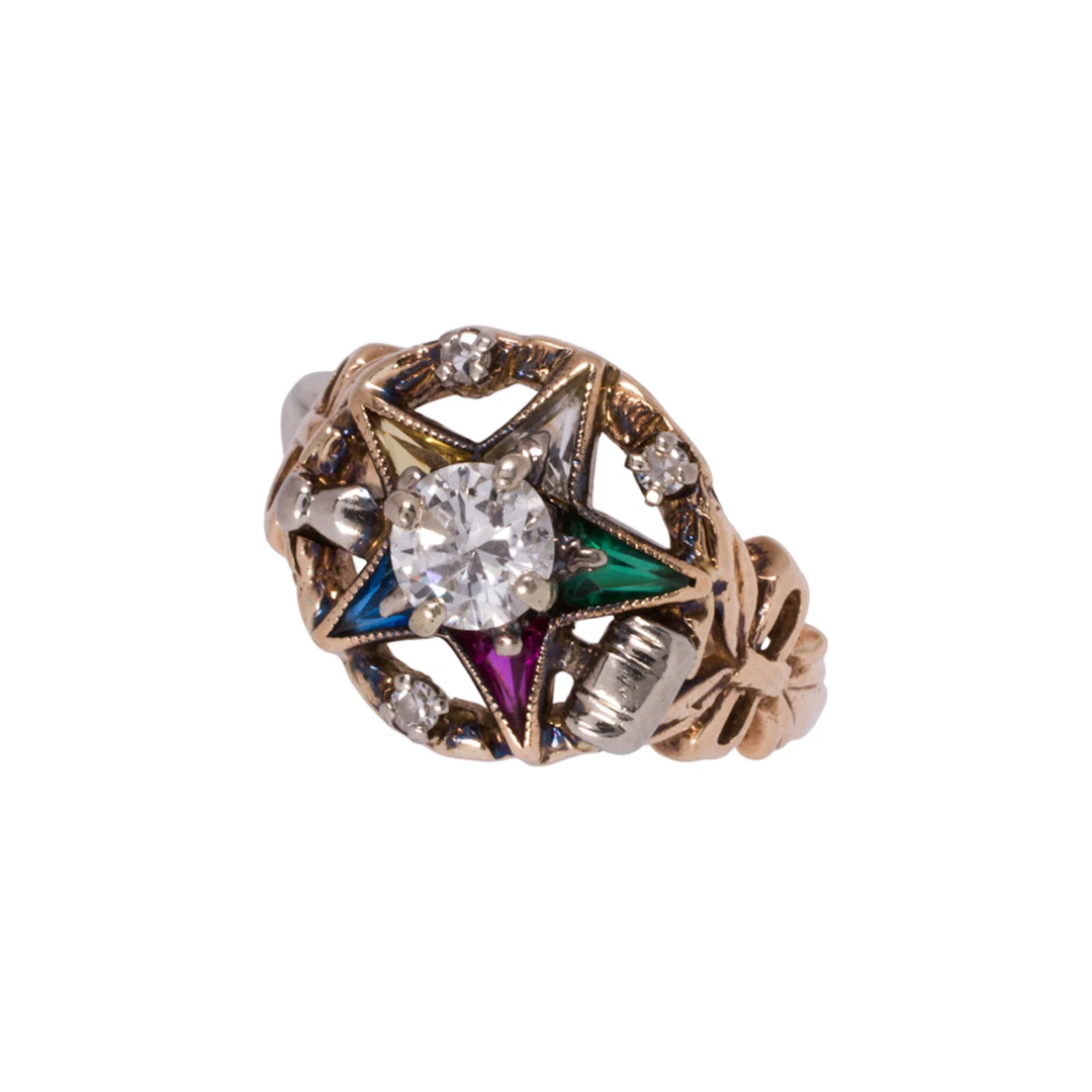 A diamond and 10k gold fraternal ring