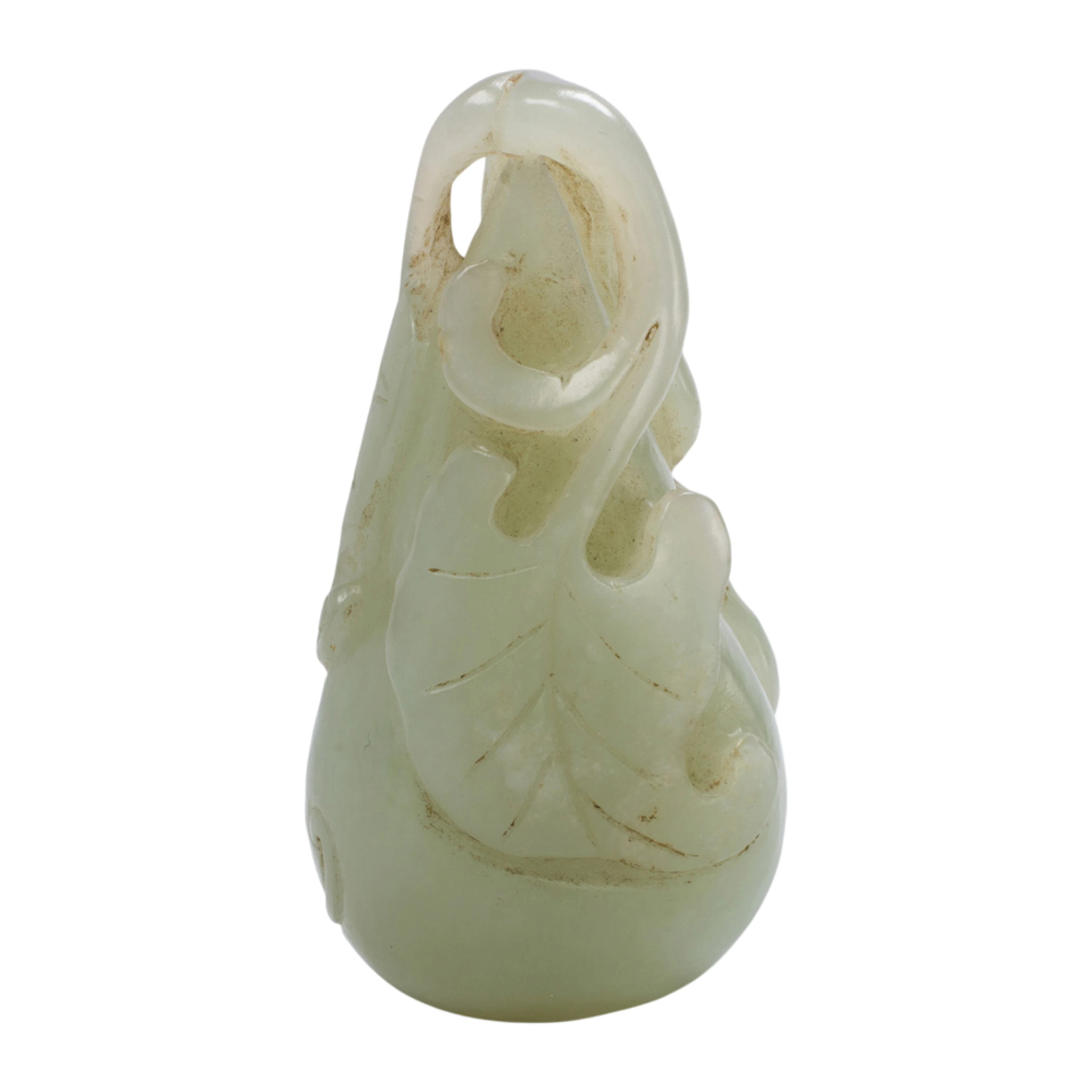 A Chinese white jade double gourd toggle