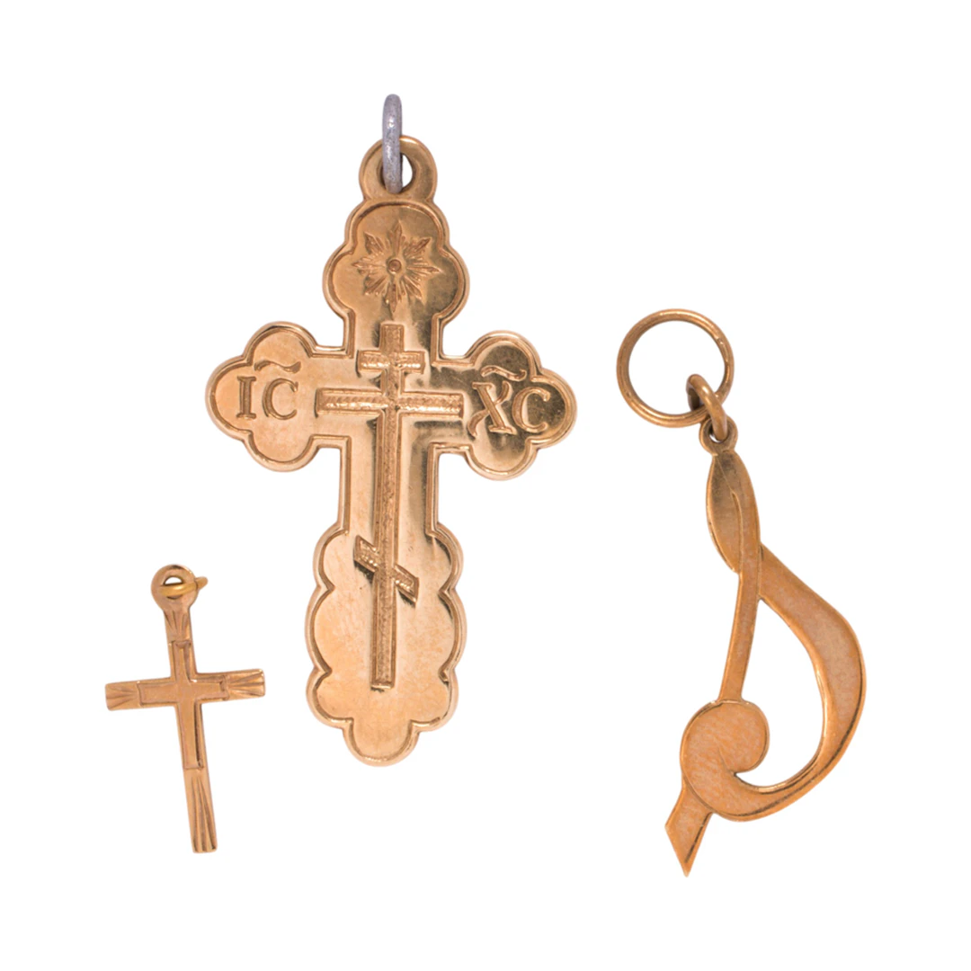 Three 14k gold pendants