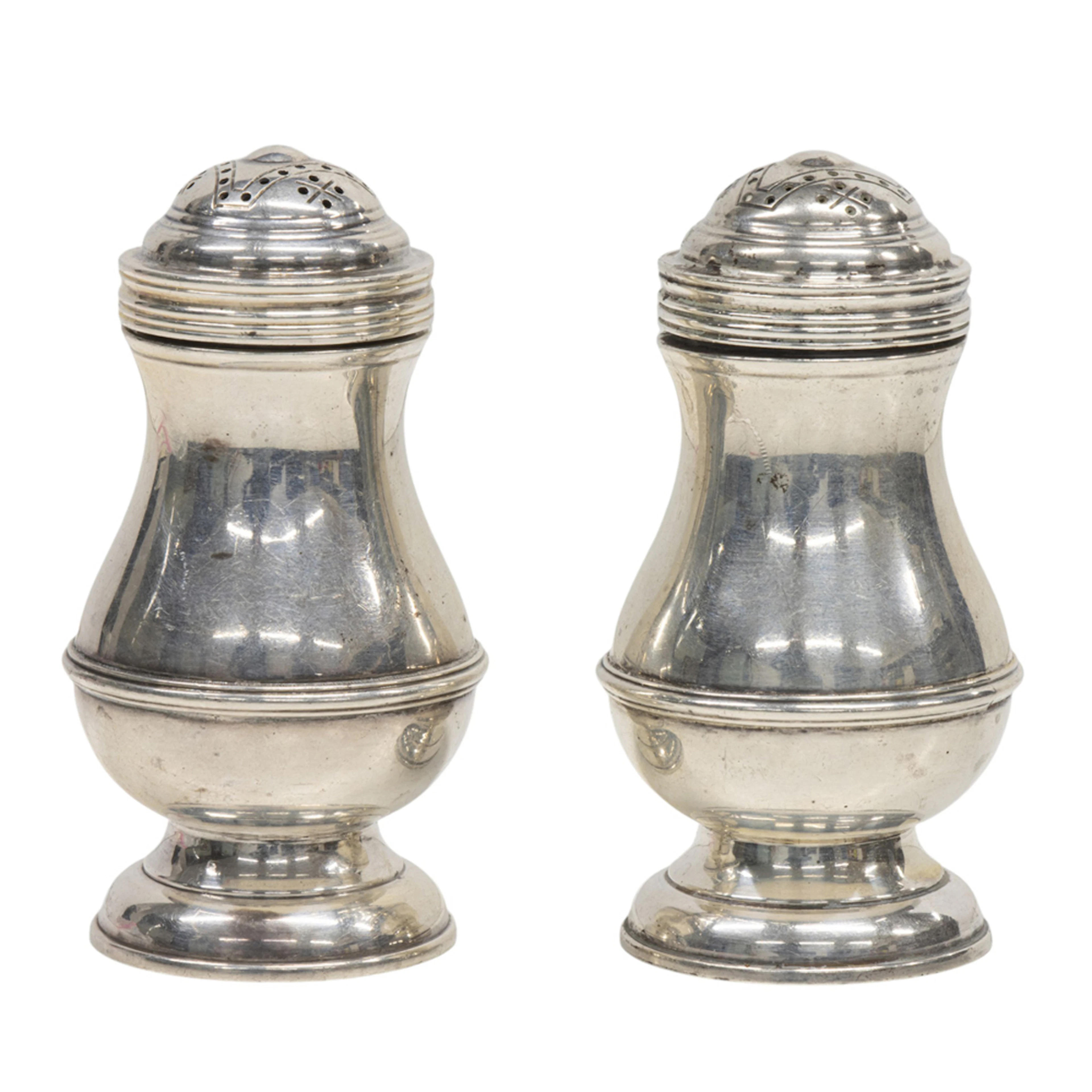 A George VI silver pair of antique reproduction casters, Walter Willson