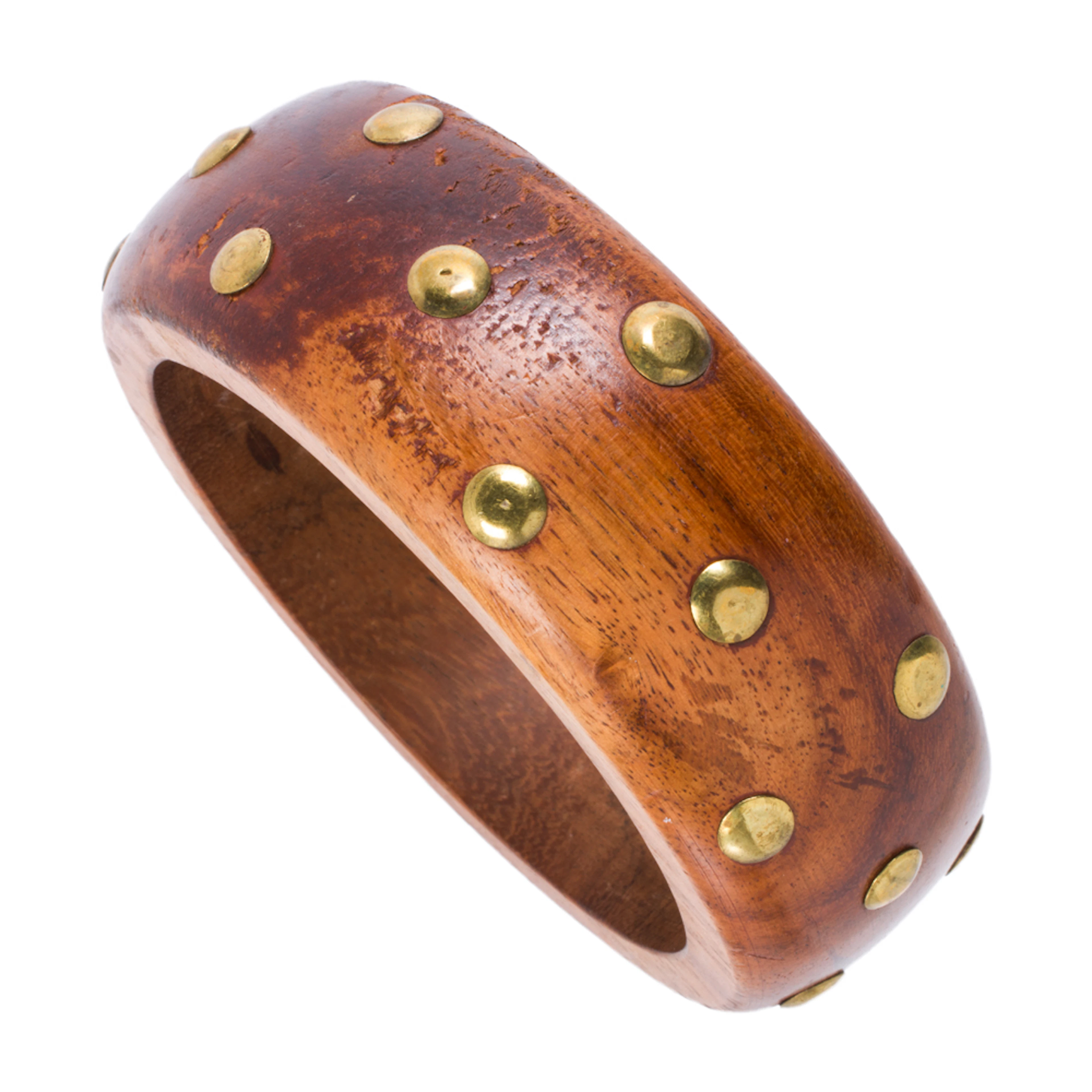 A wood and brass bracelet
