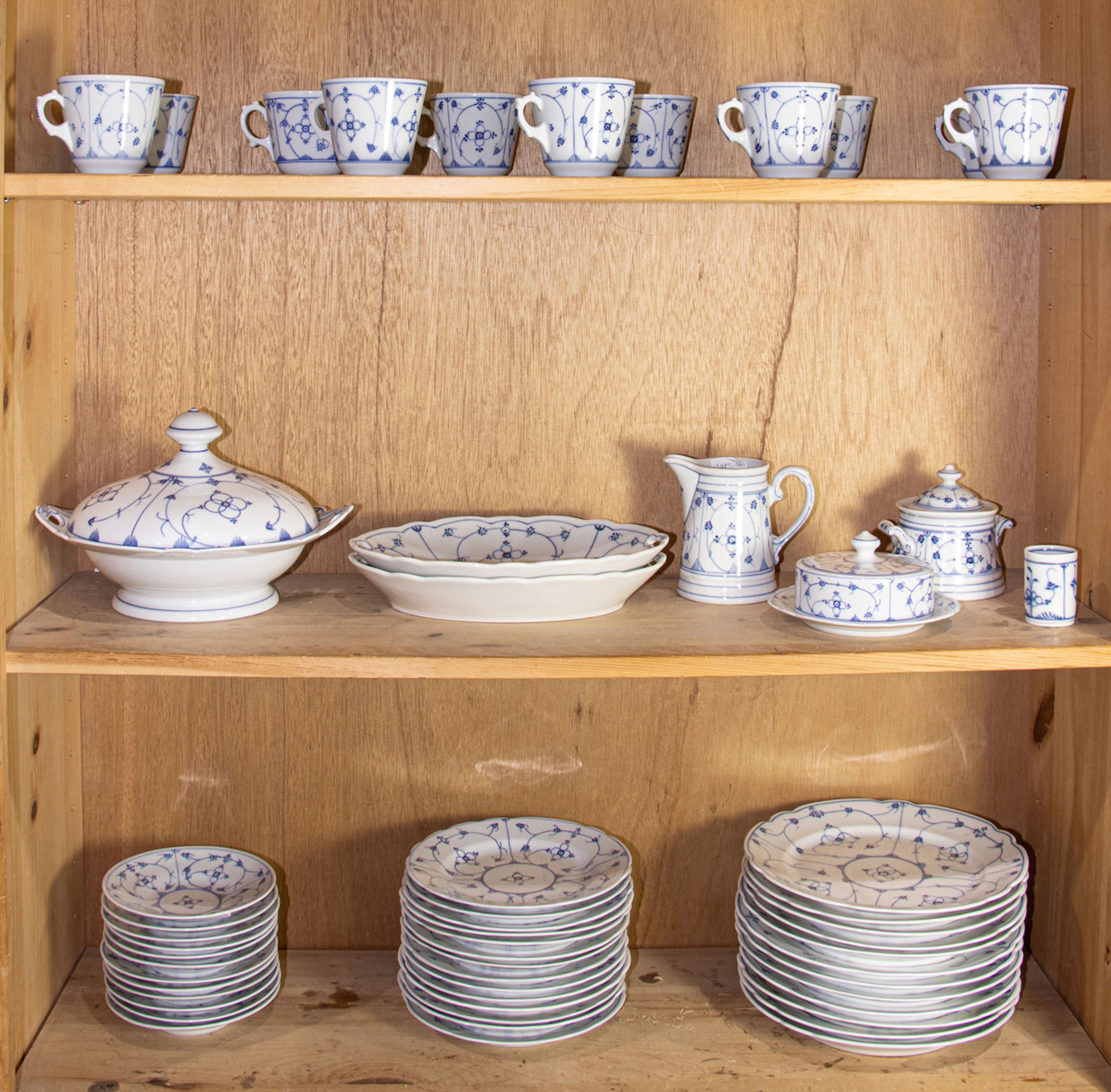 A Reinecke blue and white porcelain dinner service in a Strawflower pattern