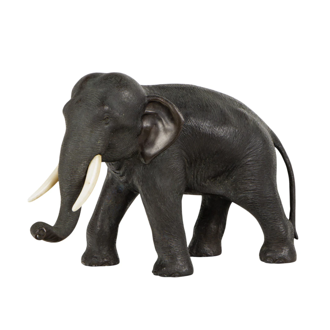 A Japanese bronze elephant figure
